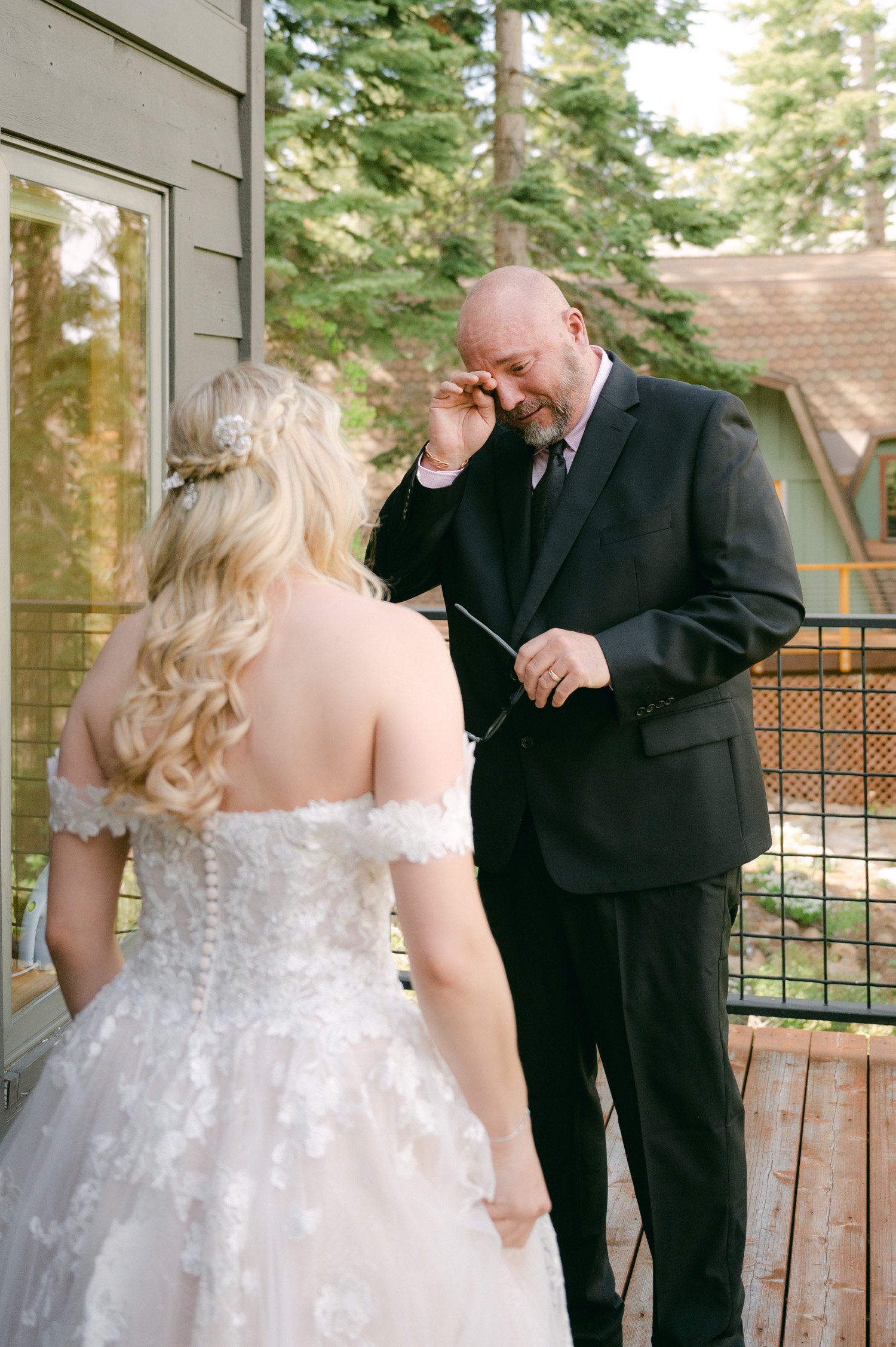 Lake Tahoe elopement, photo of brides dad getting emotional 