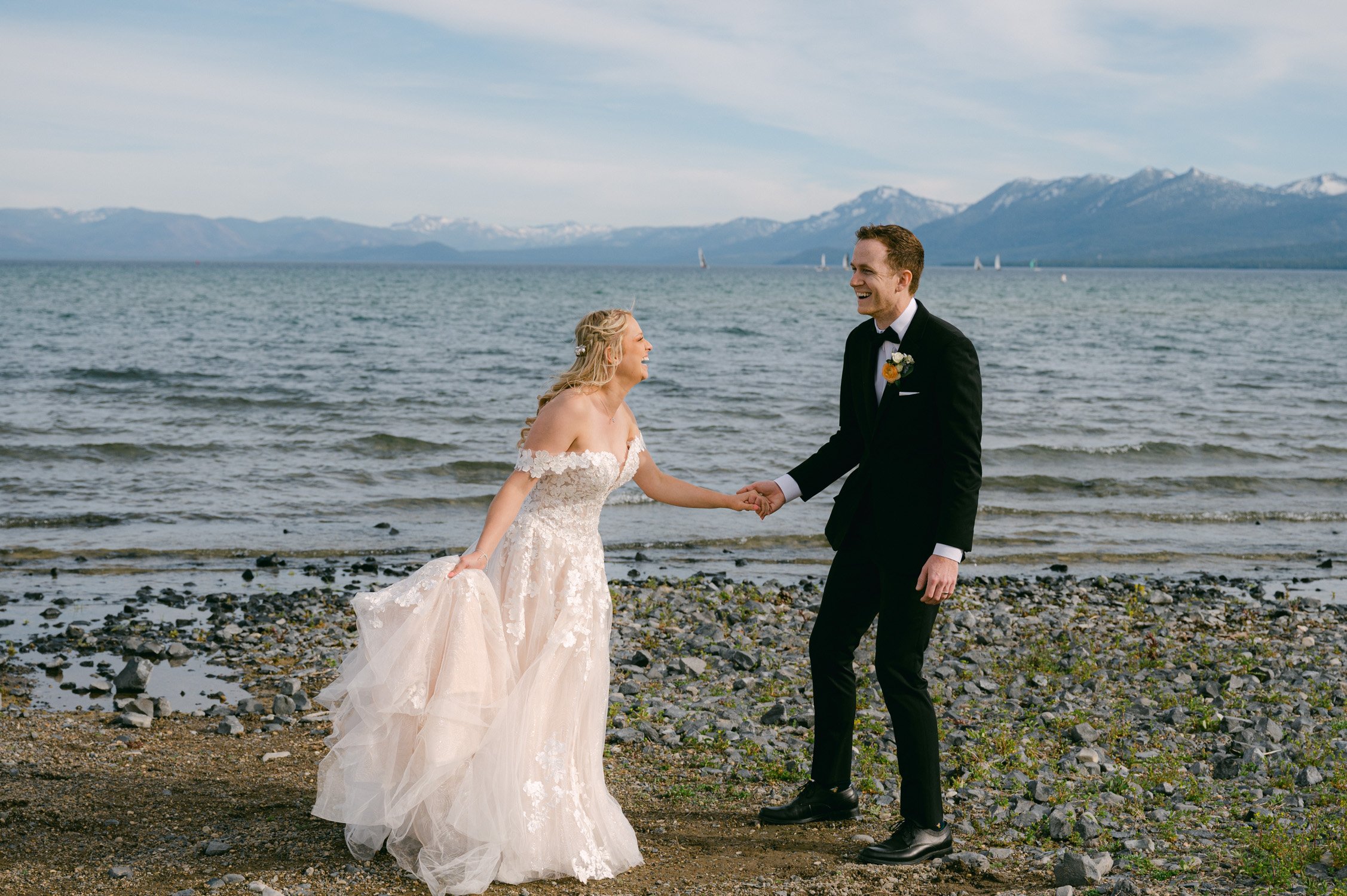 Lake Tahoe elopement photo, photo of couple laughing by the lake