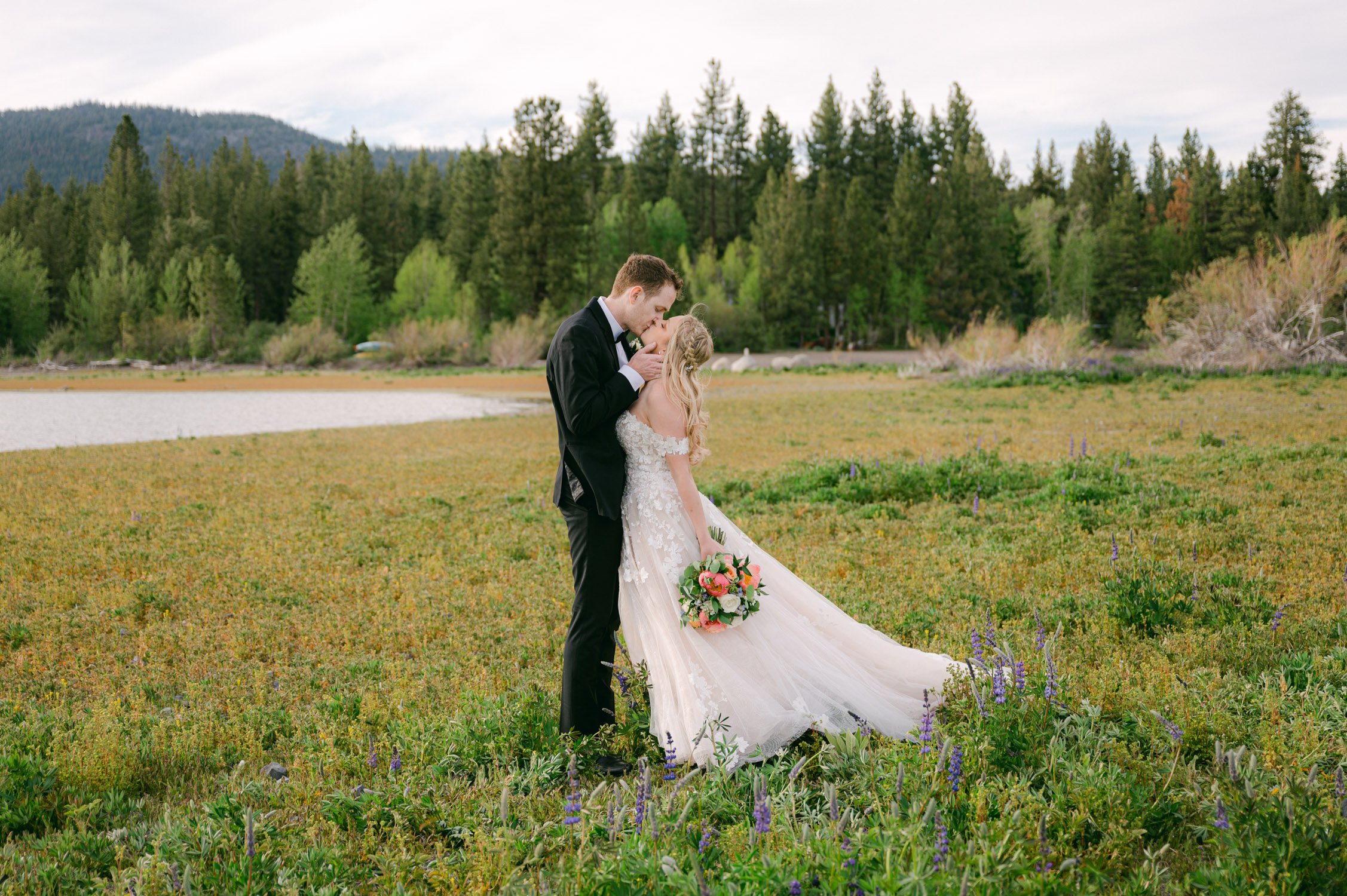 Lake Tahoe elopement photos, photo of couple kissing on the meadows