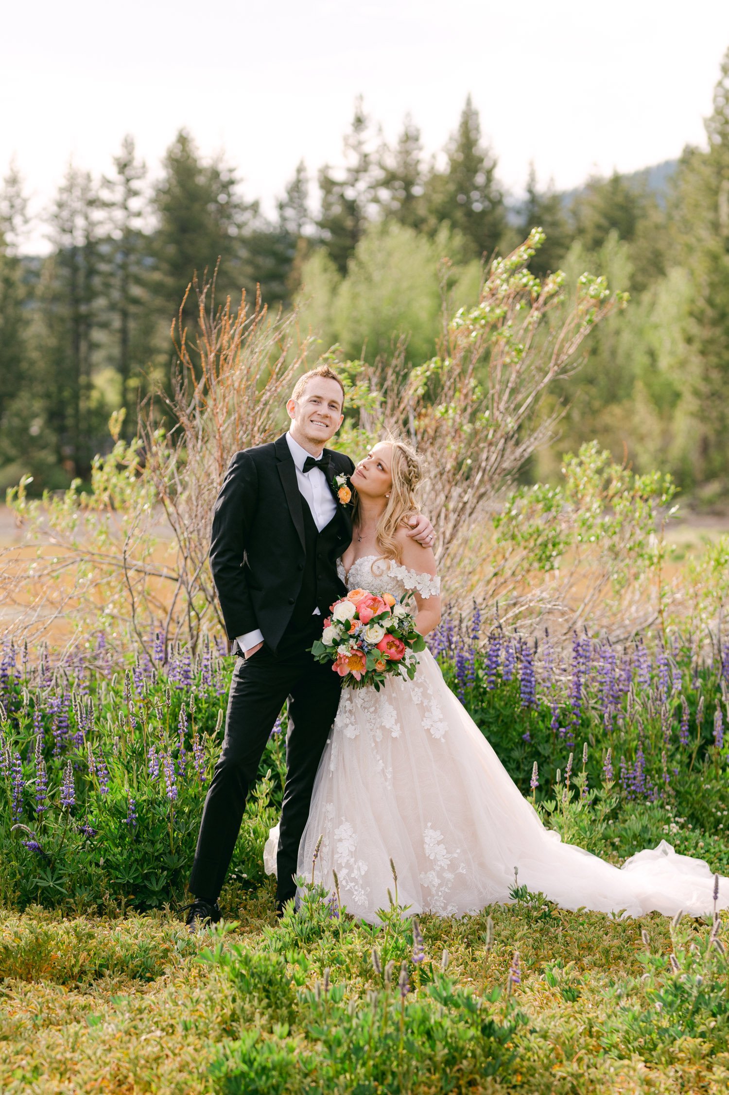Lake Tahoe elopement photos, photo of couple standing on a meadow 