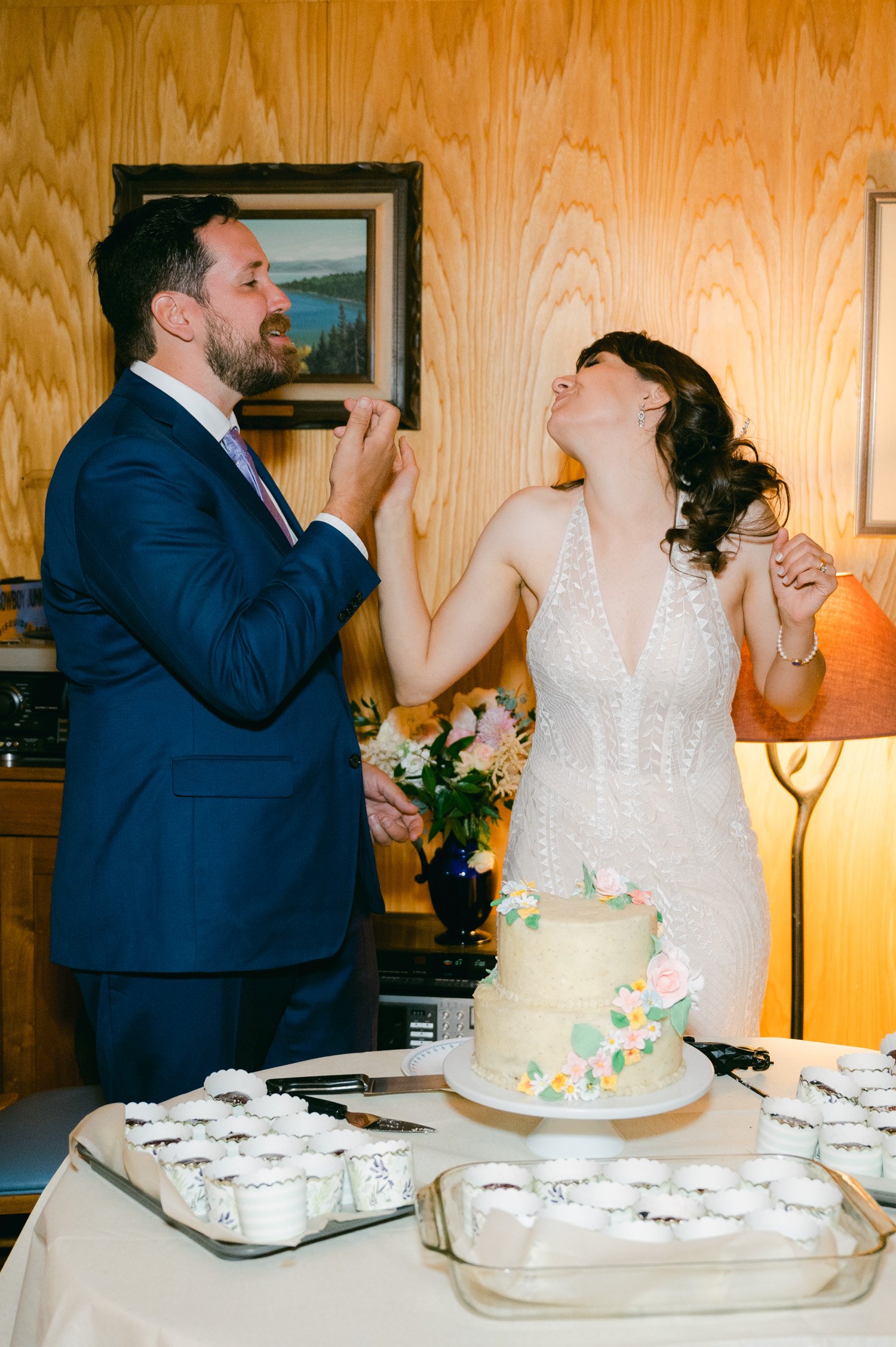 Adventure elopement in Lake Tahoe, photo of couple eating cake
