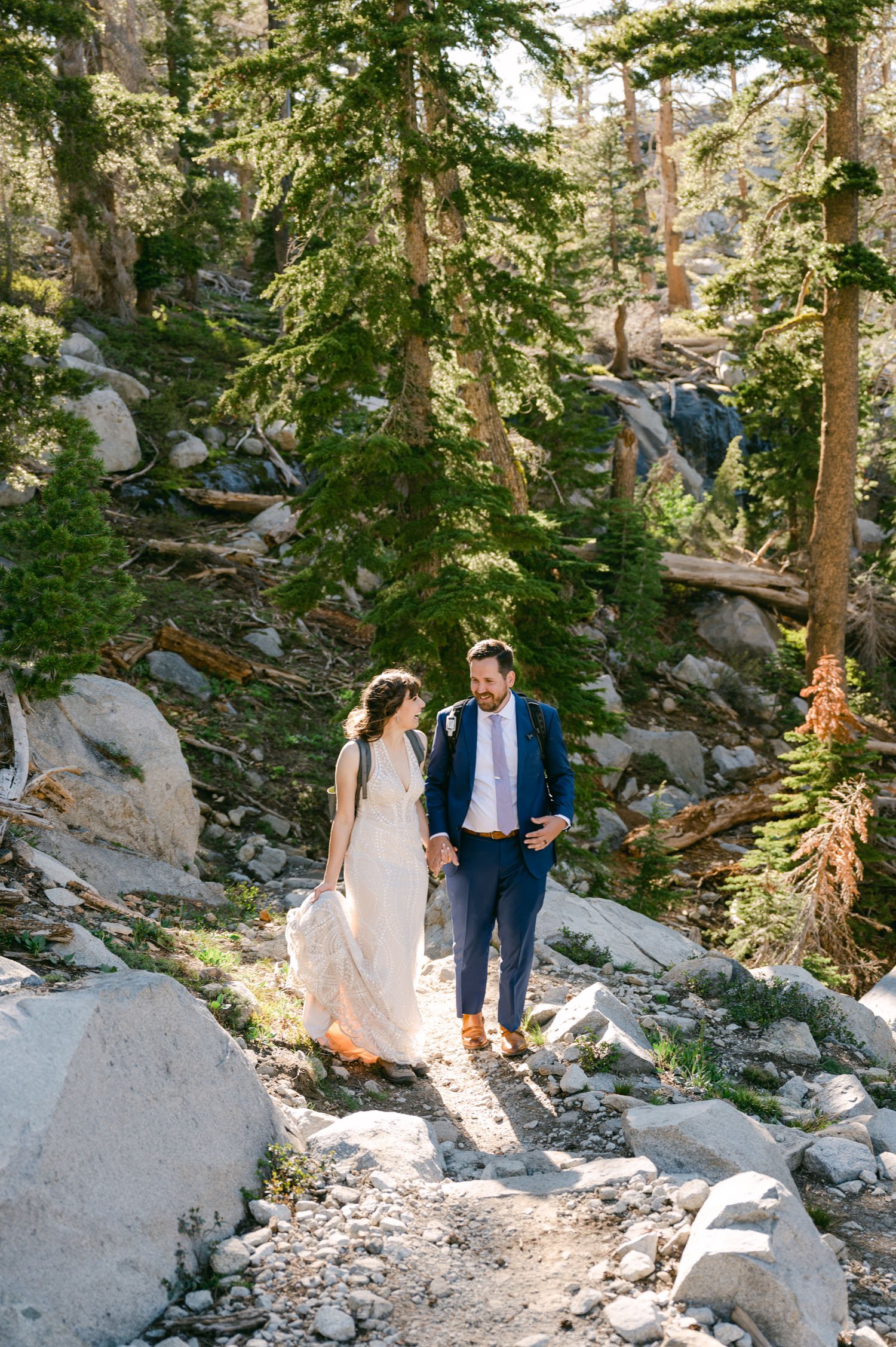 Adventure elopement in Lake Tahoe, photo of couple walking on a tahoe trail during golden hour