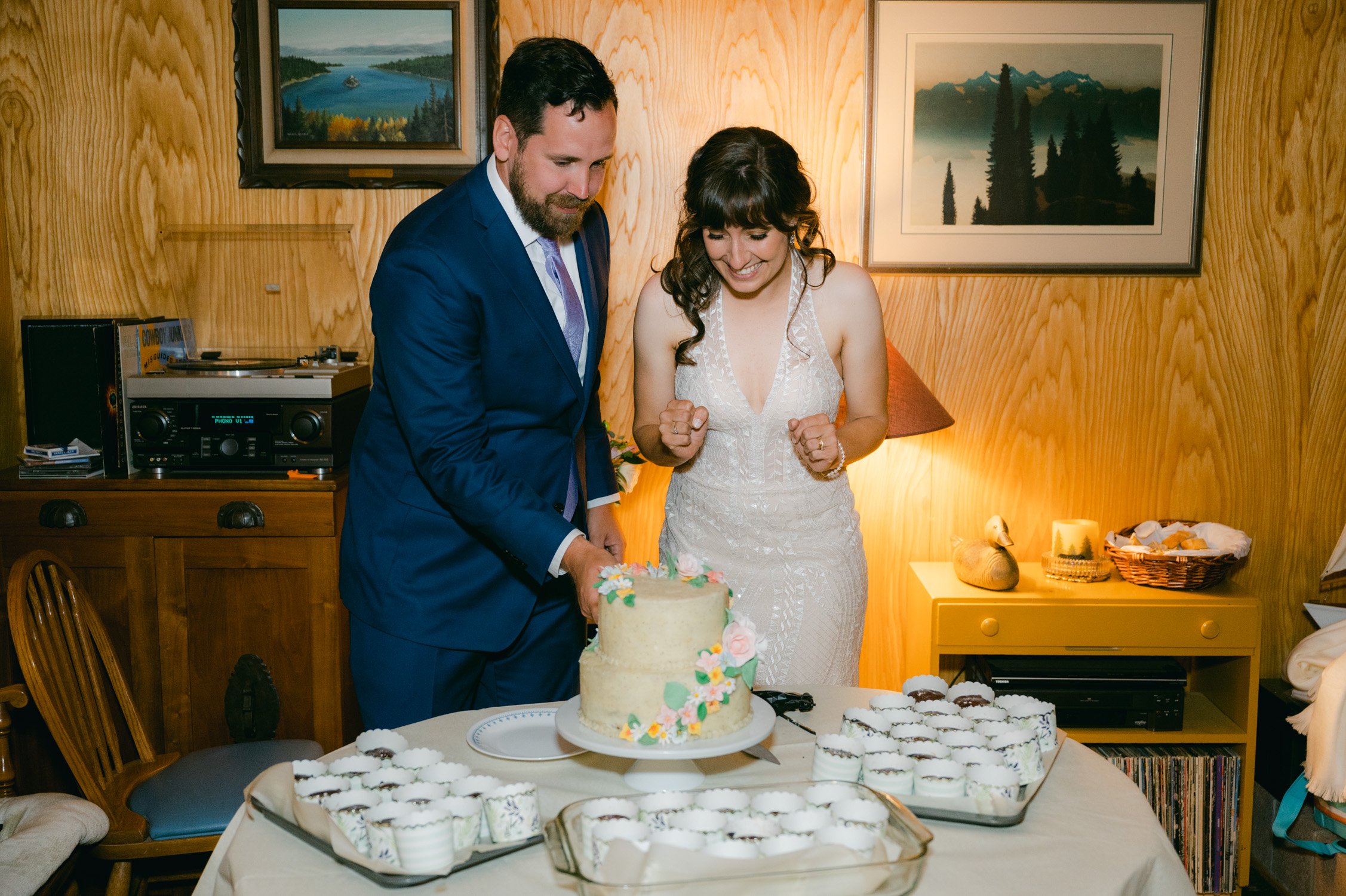 Adventure elopement in Lake Tahoe, photo of couple cutting their cake