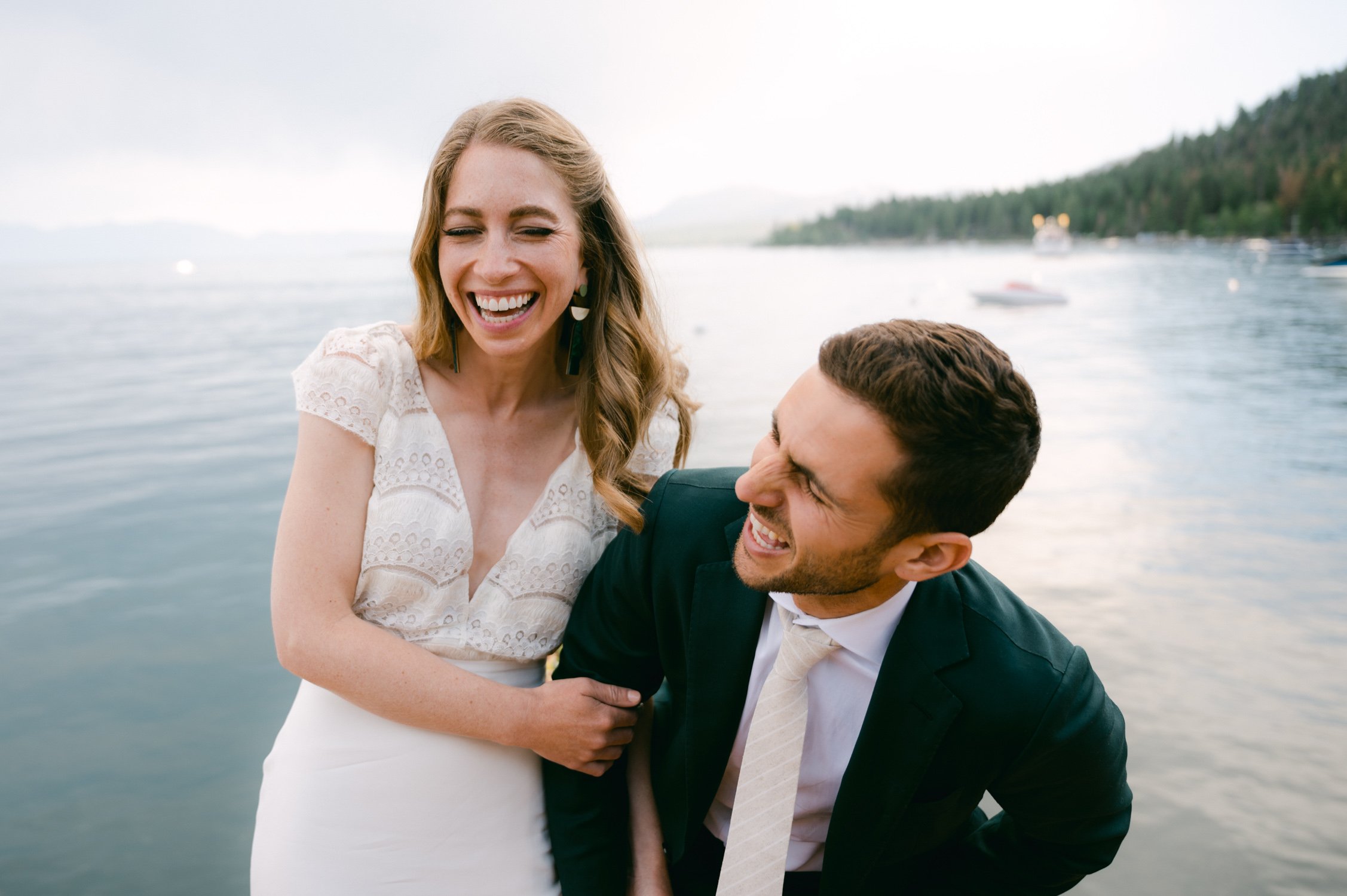 West Shore Private Estate Wedding, photo of couple laughing on a dock