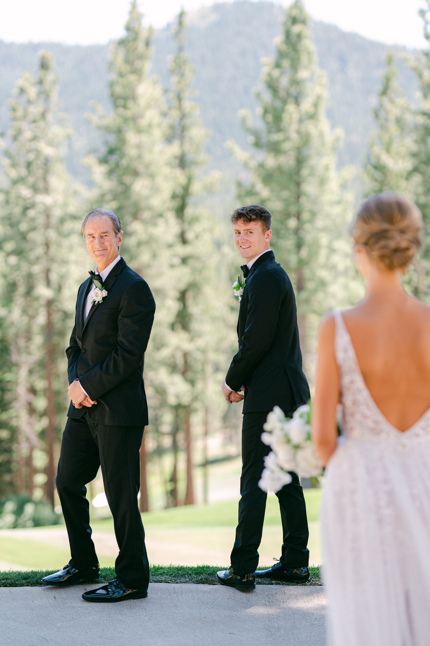 Martis Camp Wedding photo of a bride's first look with her father and brother