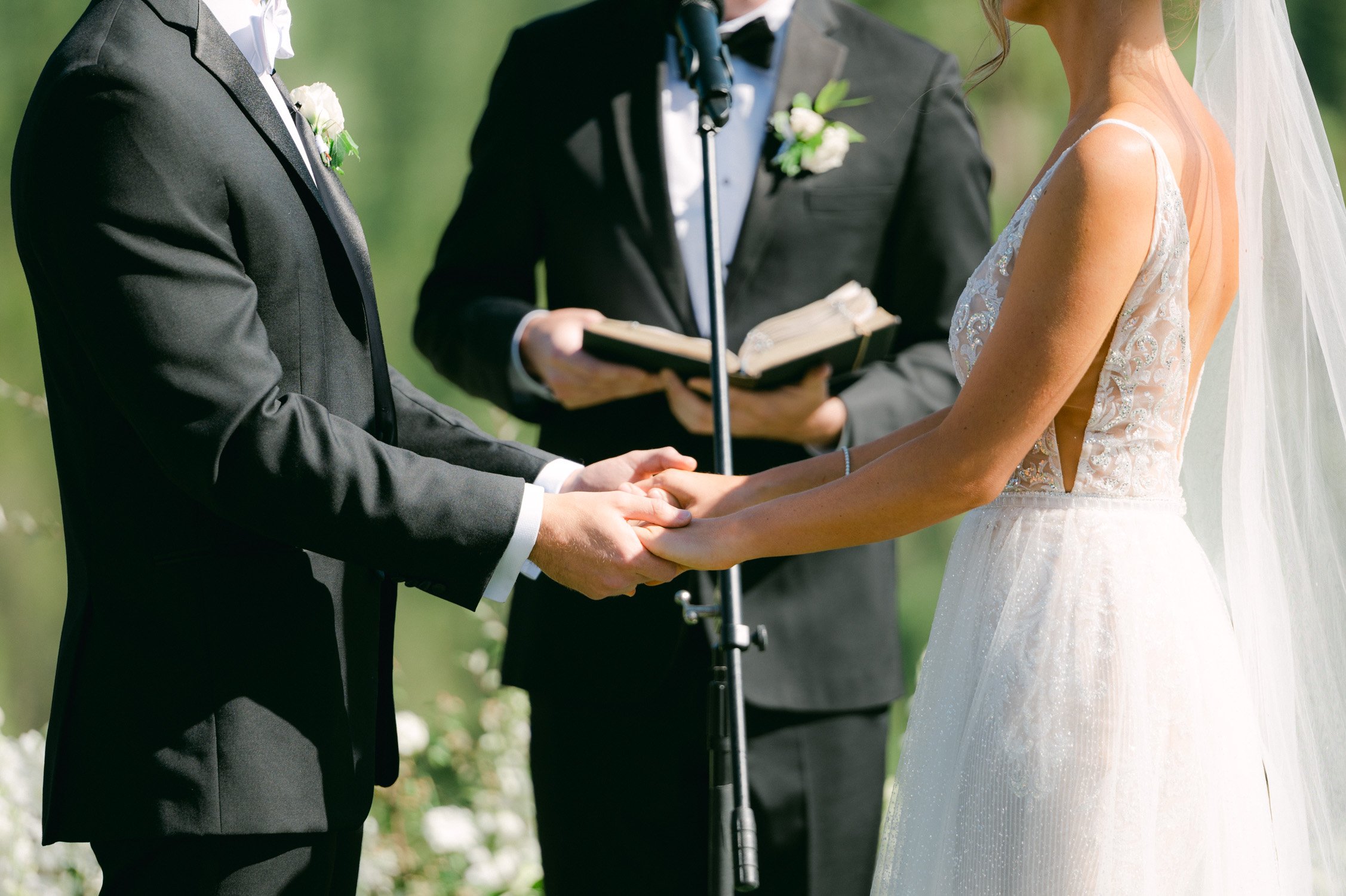Martis Camp wedding, photo of couple holding hands