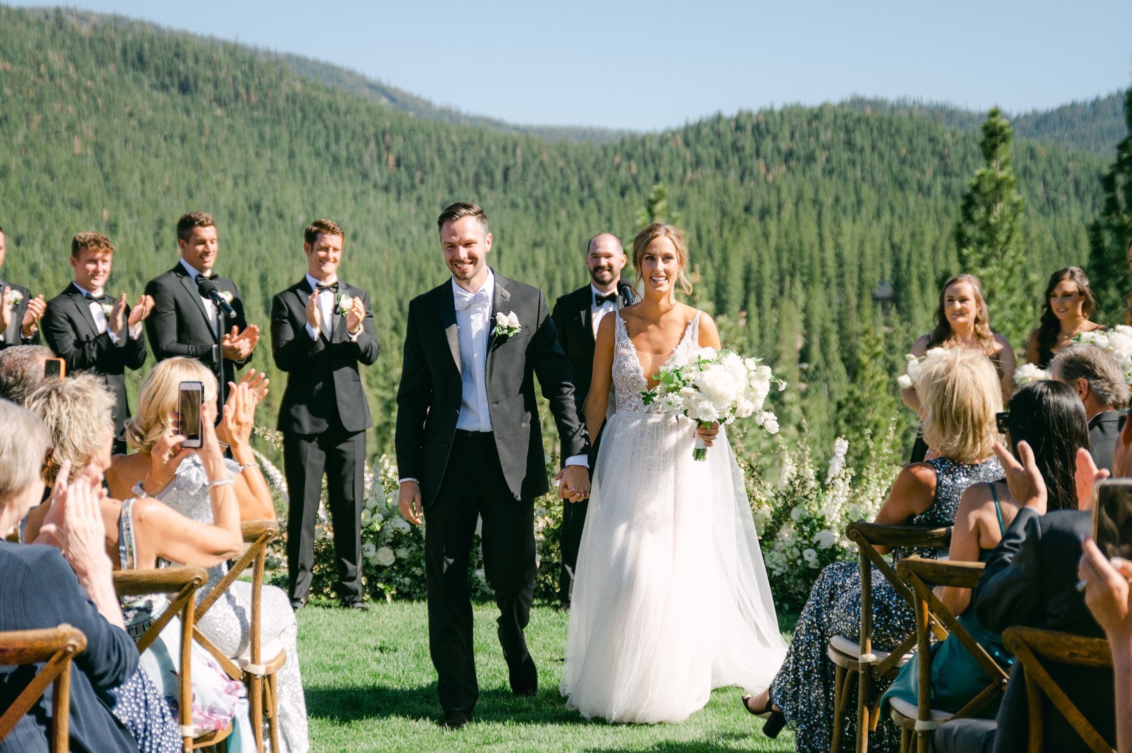 Martis Camp wedding, photo of couple walking down the aisle 