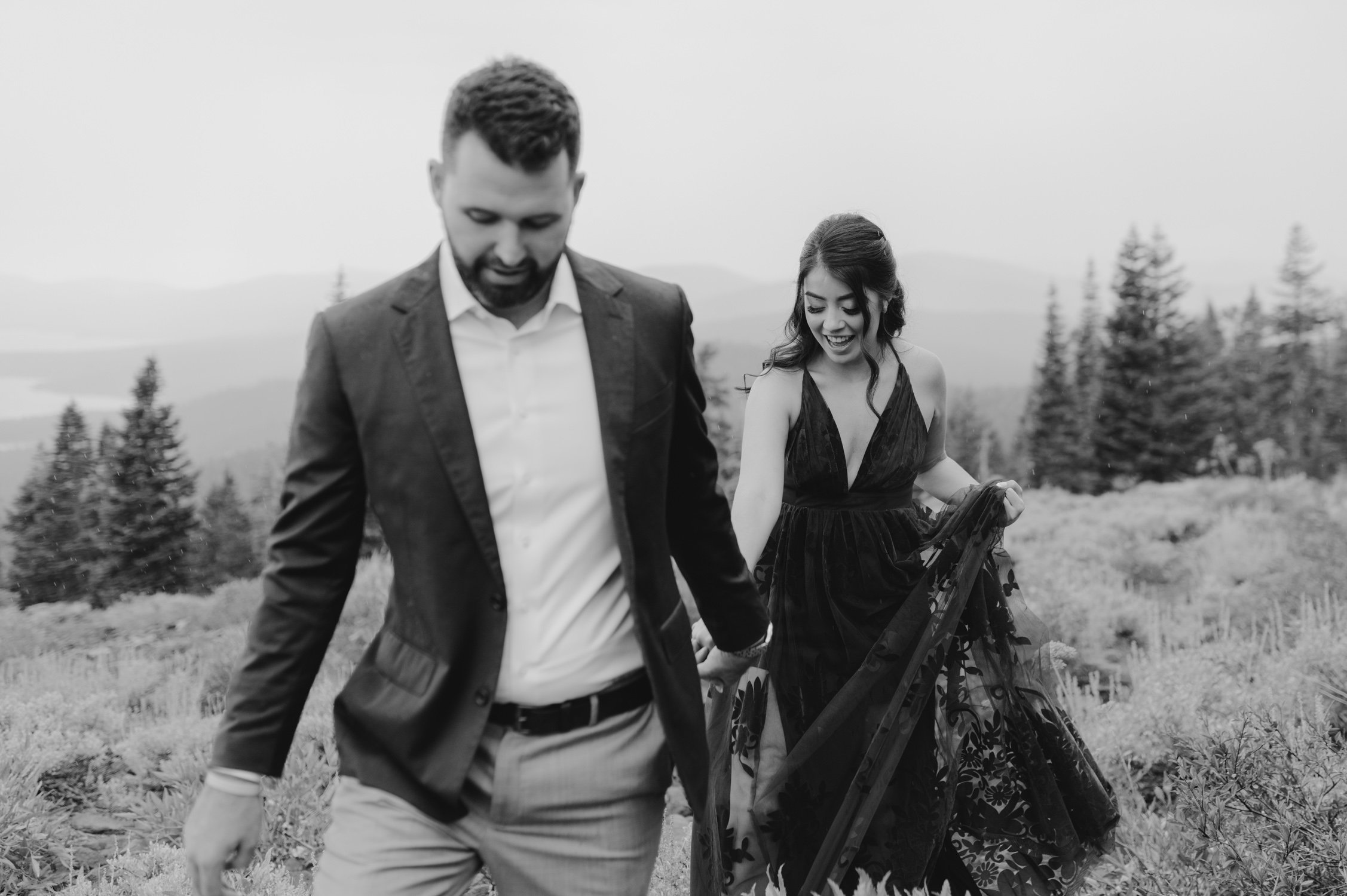 Lake Tahoe Engagement session, photo of couple holding hands while they walk 