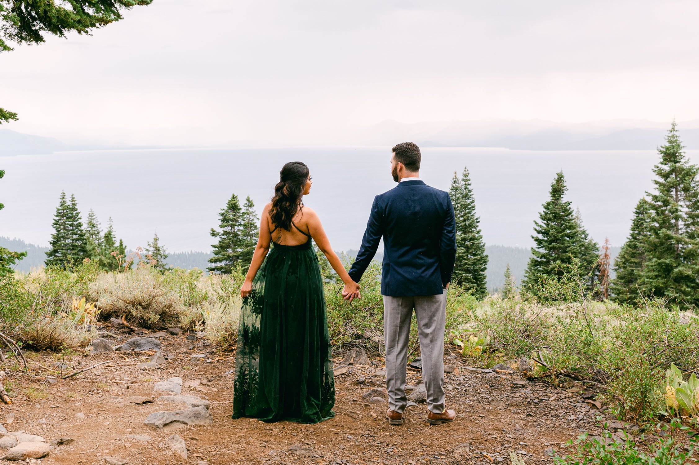 Lake Tahoe Engagement session, photo of couple looking at each other at a tahoe lookout 