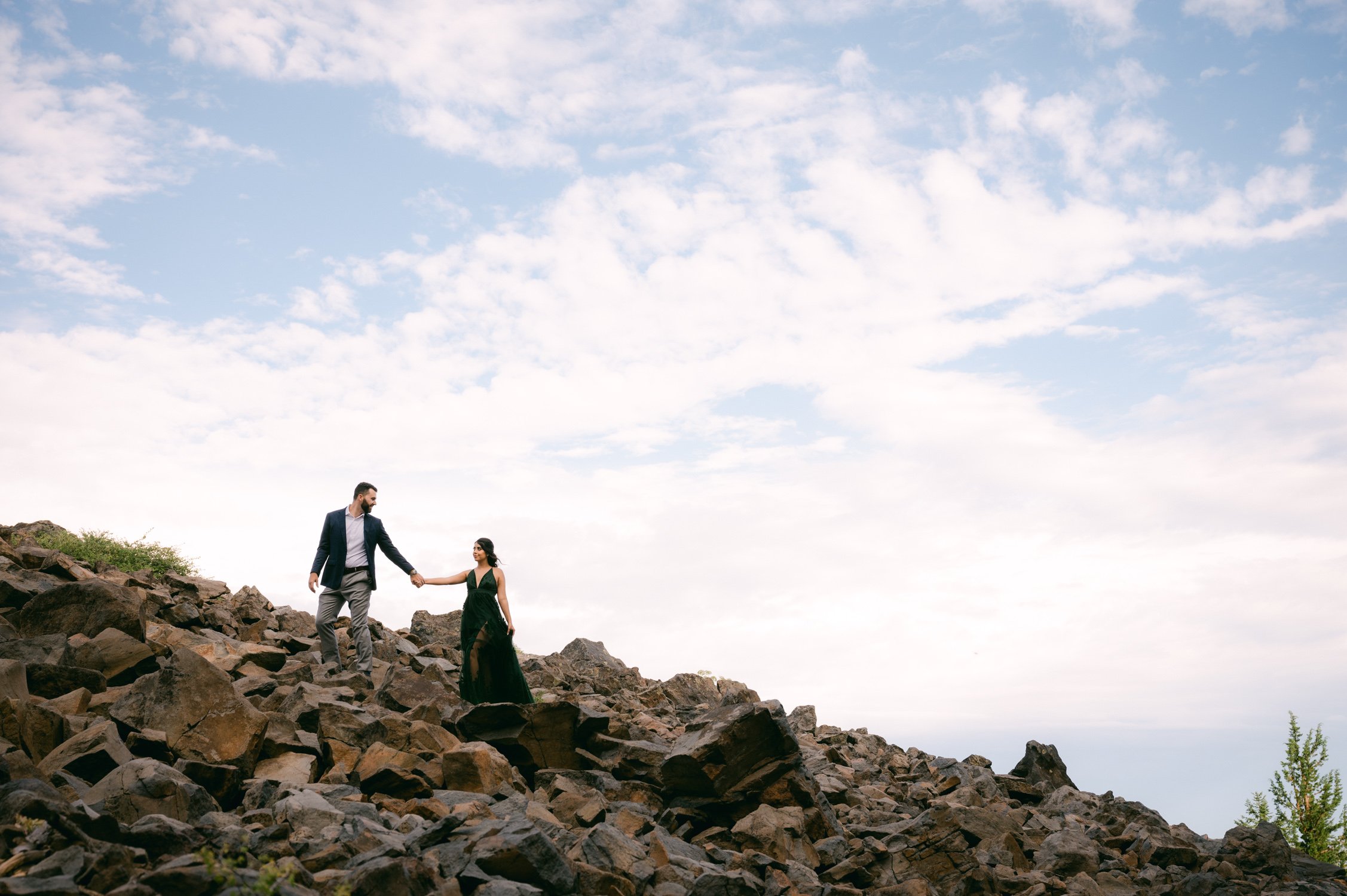 Lake Tahoe Engagement session, photo of couple climbing a granite hill 