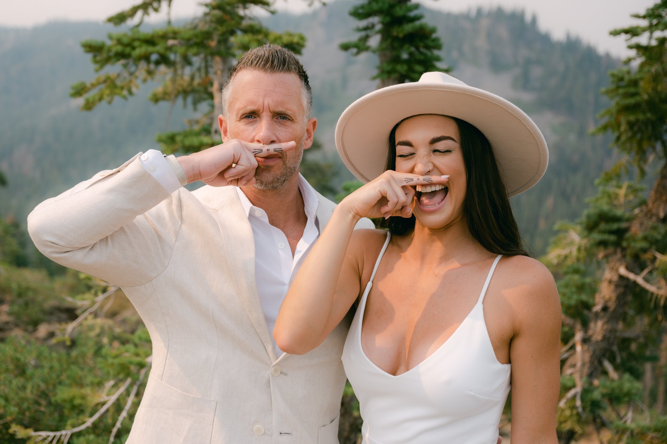 Lake Tahoe Yacht wedding, photo of couple with matching cat whiskers tattoo 