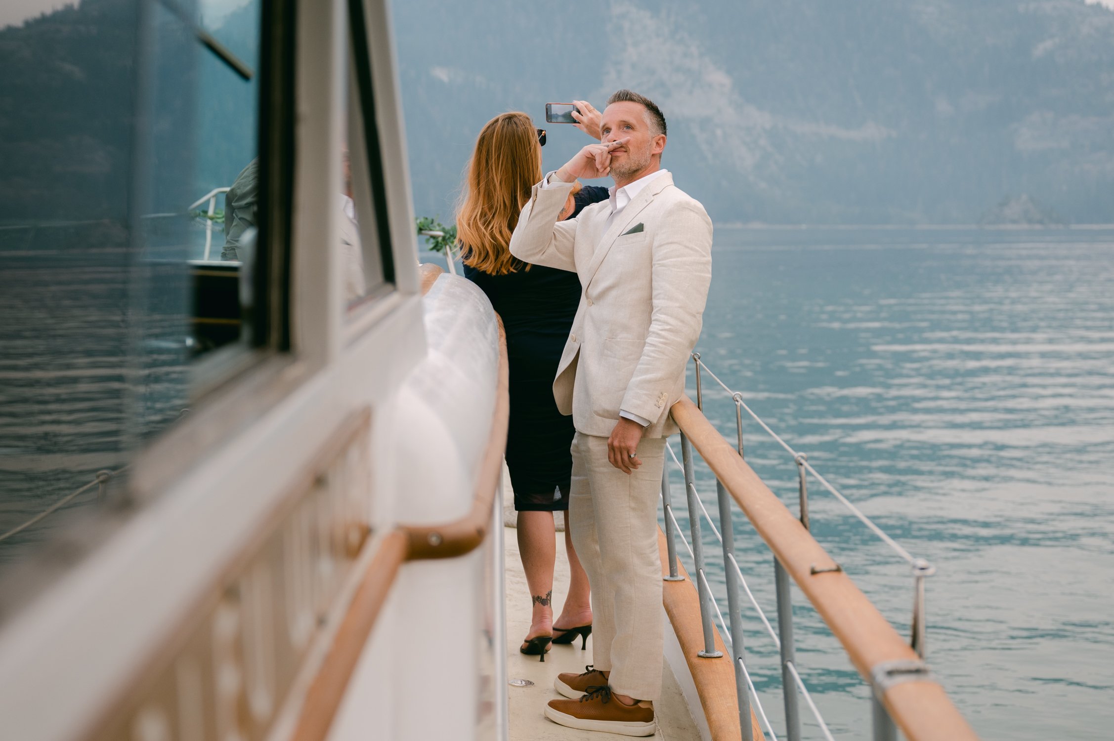 Lake Tahoe Yacht wedding, photo of groom with his cat whisker tattoo 