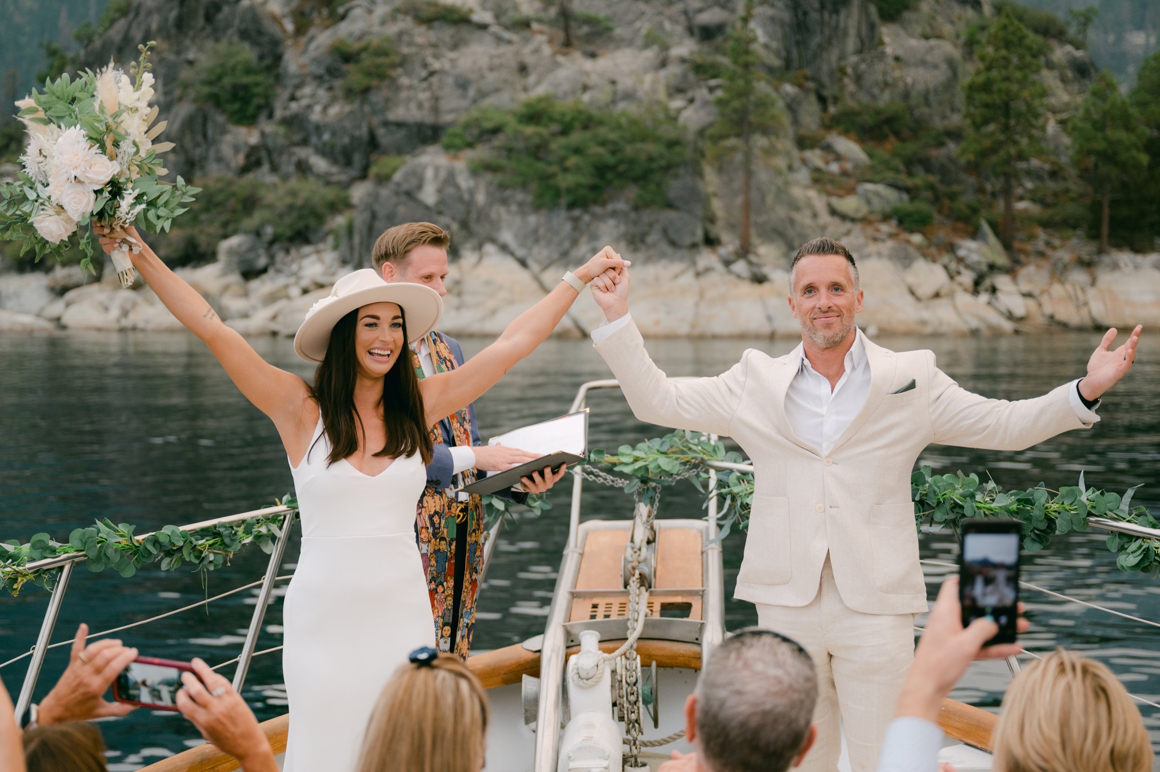 Lake Tahoe Yacht wedding, photo of the couple celebrating with friends and family after their ceremony. 