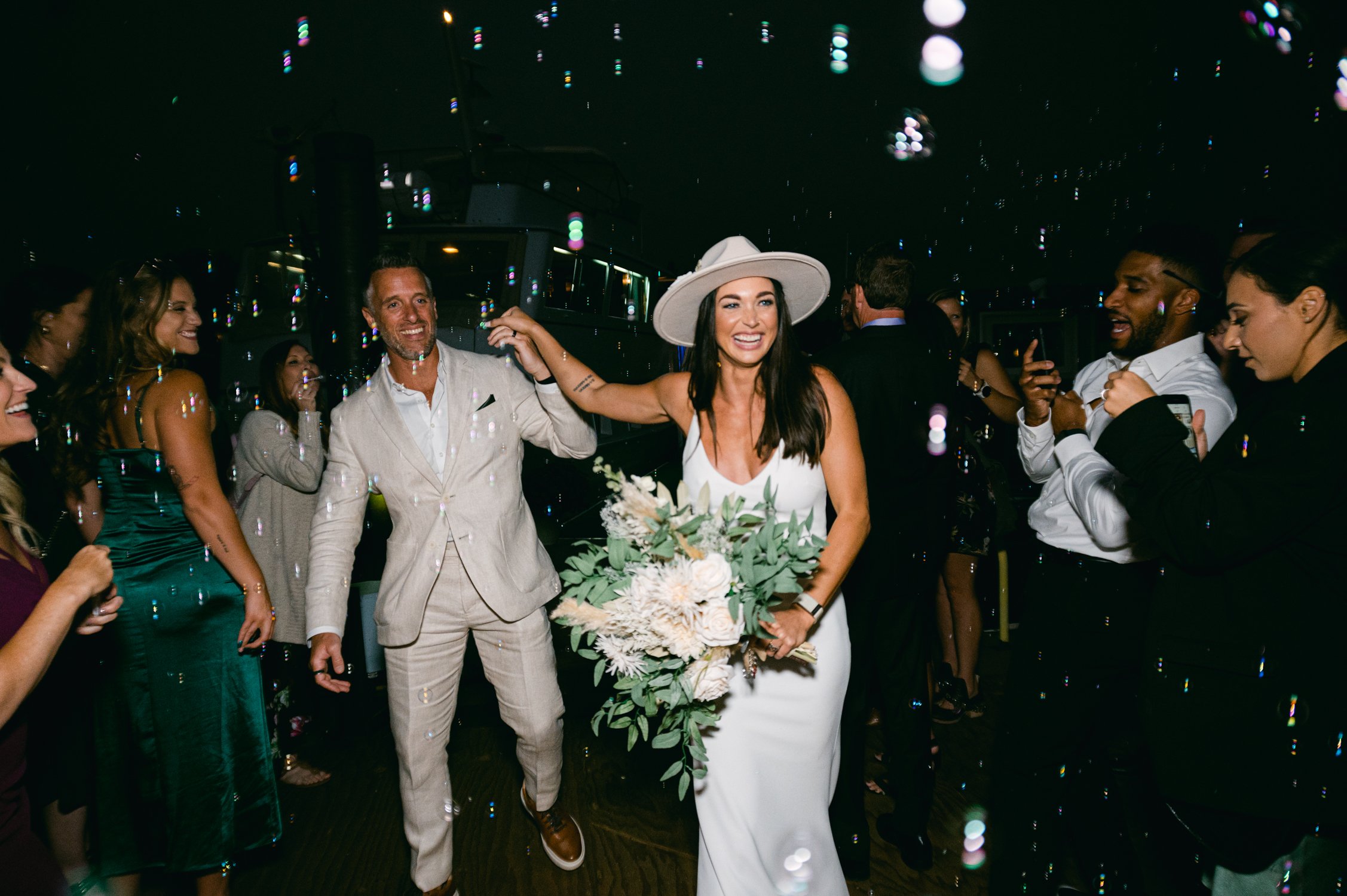 Lake Tahoe Yacht wedding, photo of couple during their bubble exit 