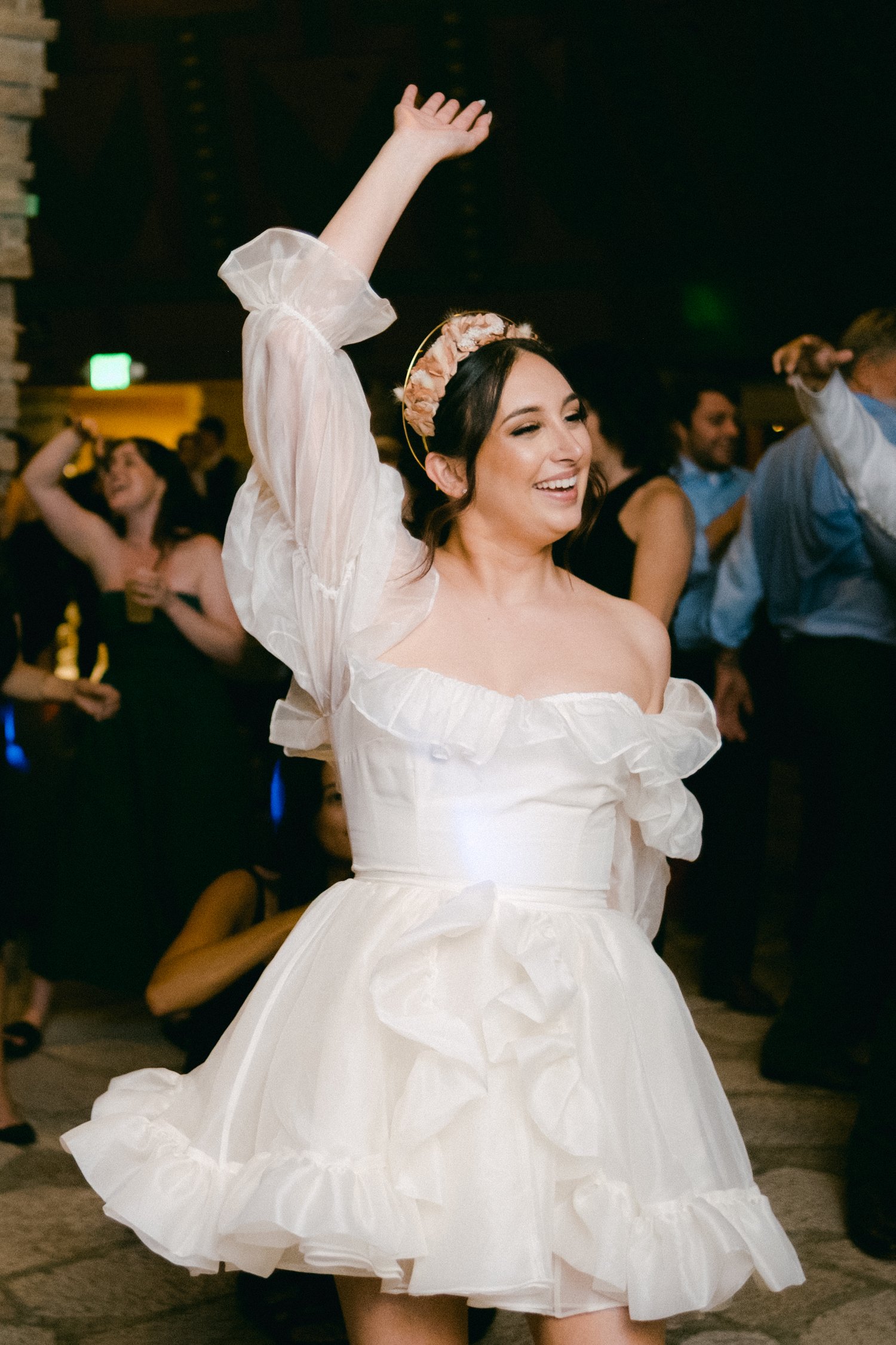 Nakoma Wedding photography, photo of bride dancing after an outfit change