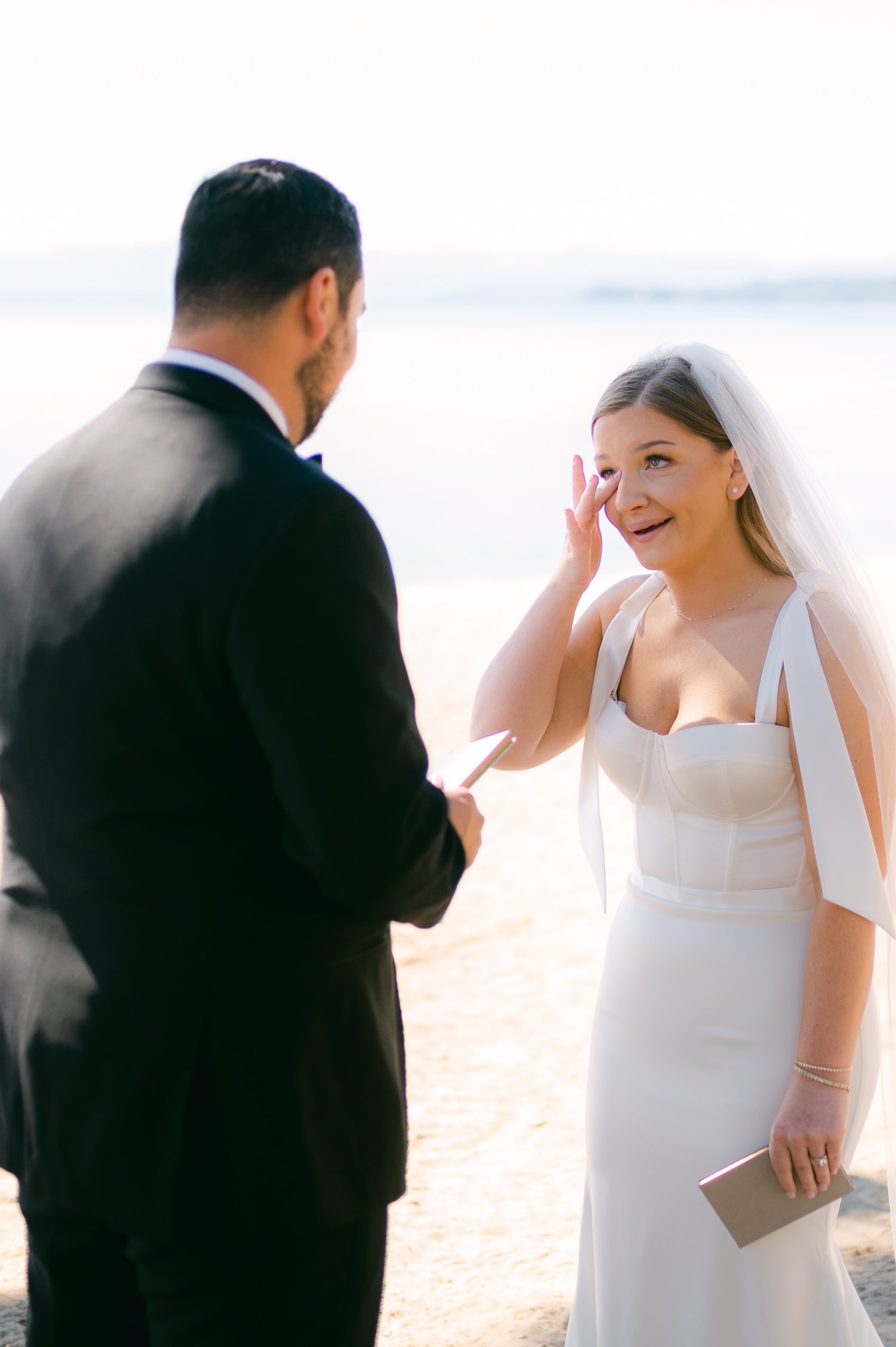 Hyatt Lake Tahoe wedding, photo of couple having a private vow reading