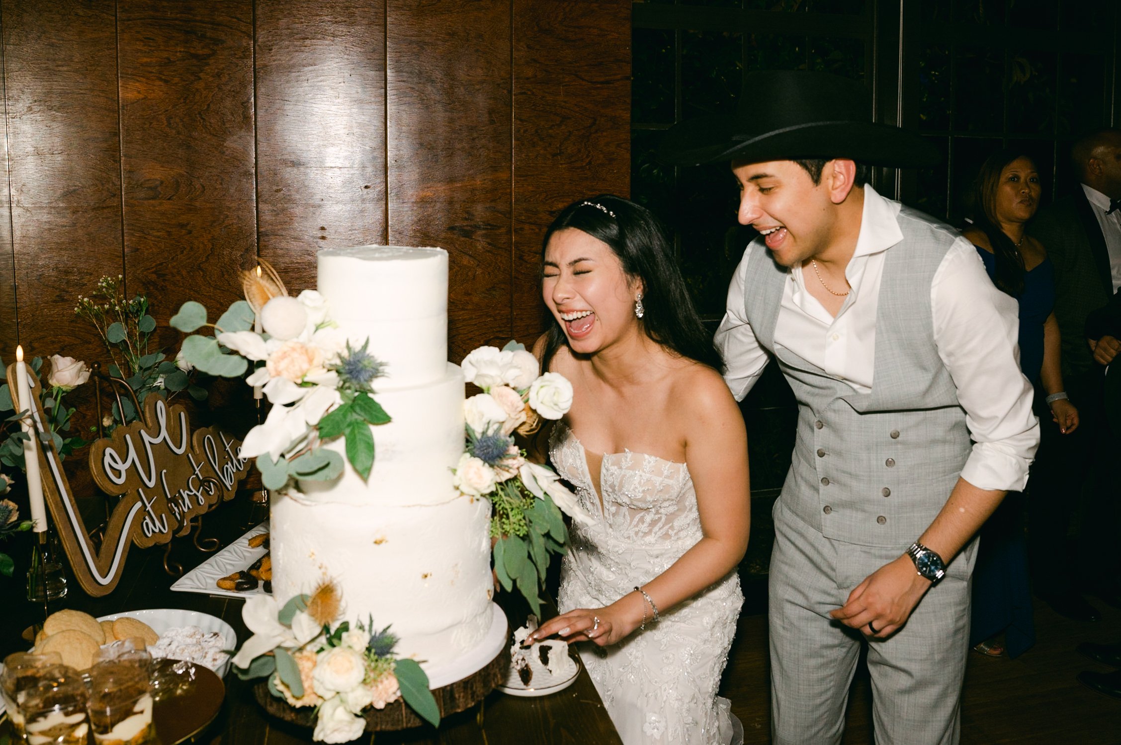 Brazilian Room Wedding in Berkeley, CA, photo of couple cutting their cake