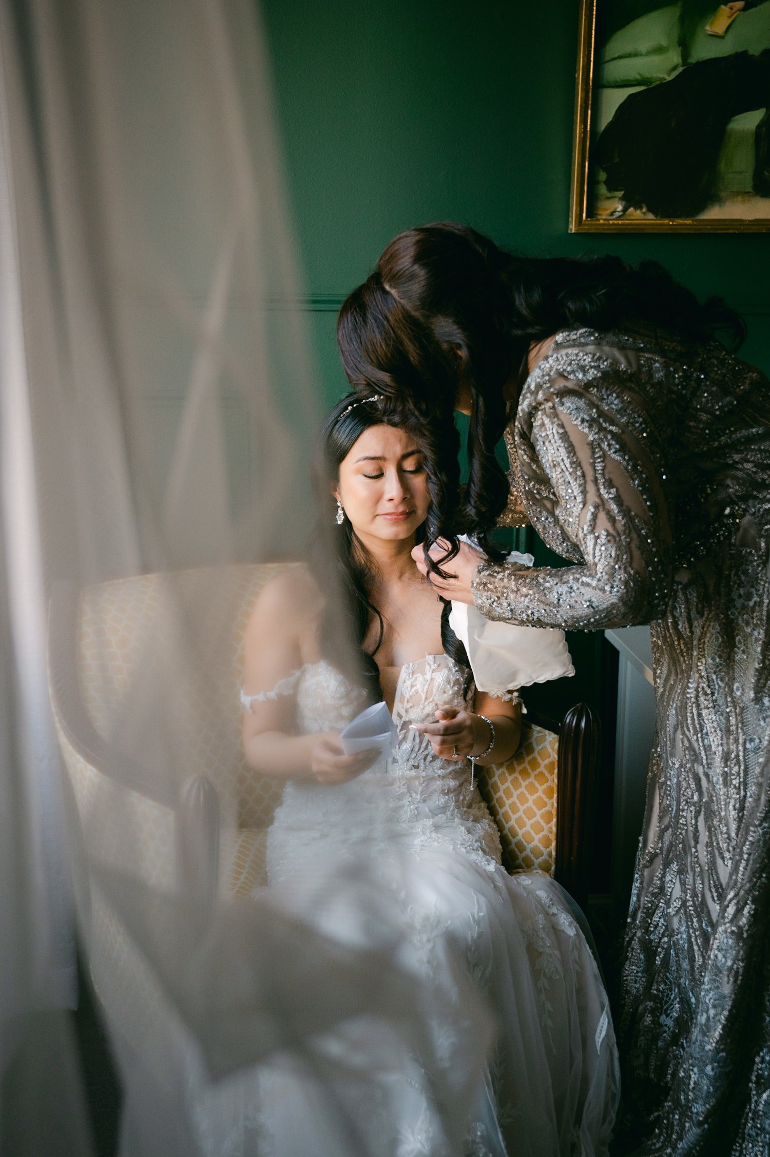 Brazilian Room Wedding in Berkeley, CA, photo of bride tearing up reading a letter from her mom