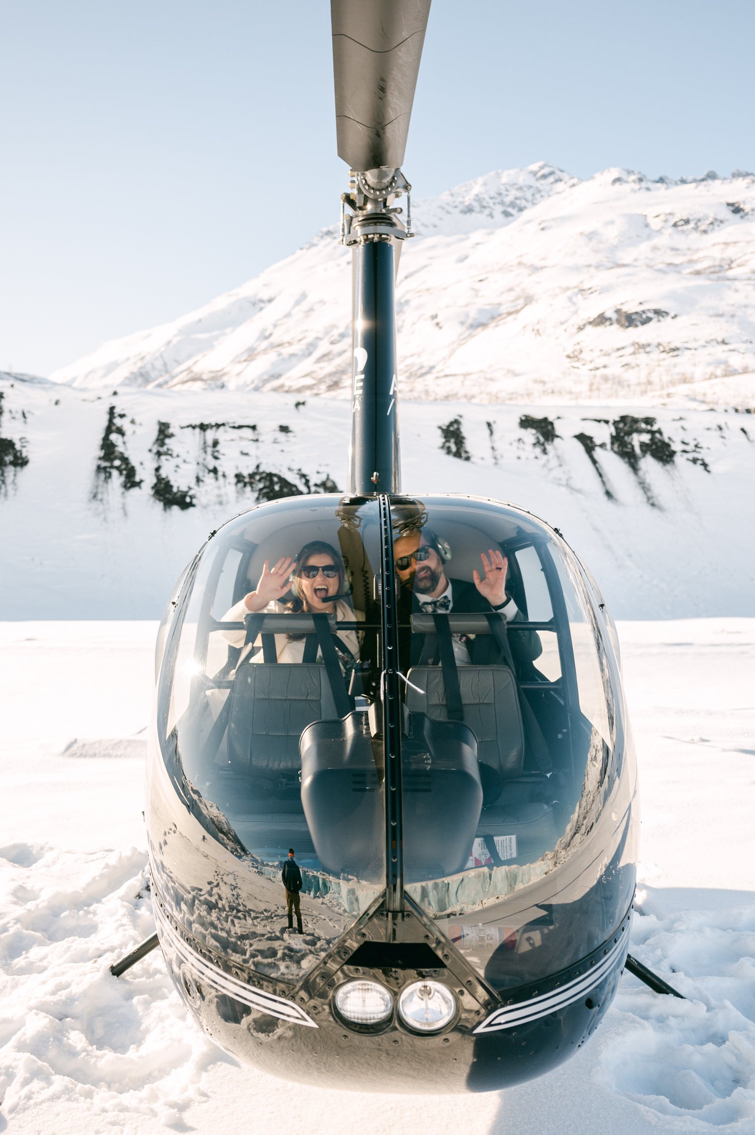 Girdwood Alaska helicopter elopement, photo of couple on a glacier