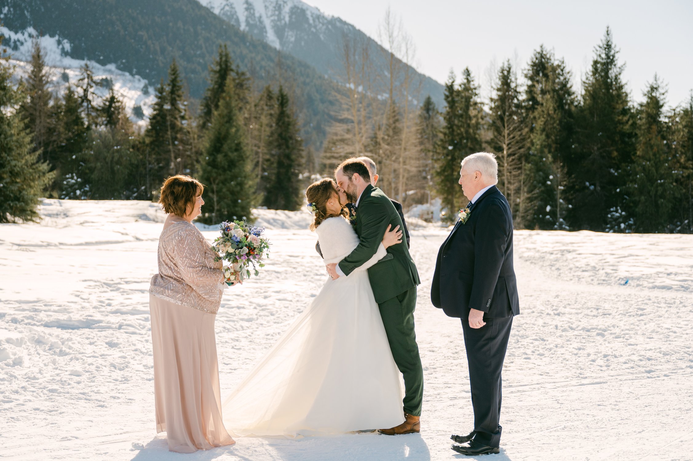 Girdwood Alaska helicopter elopement, photo of couple having their ceremony at moose meadows
