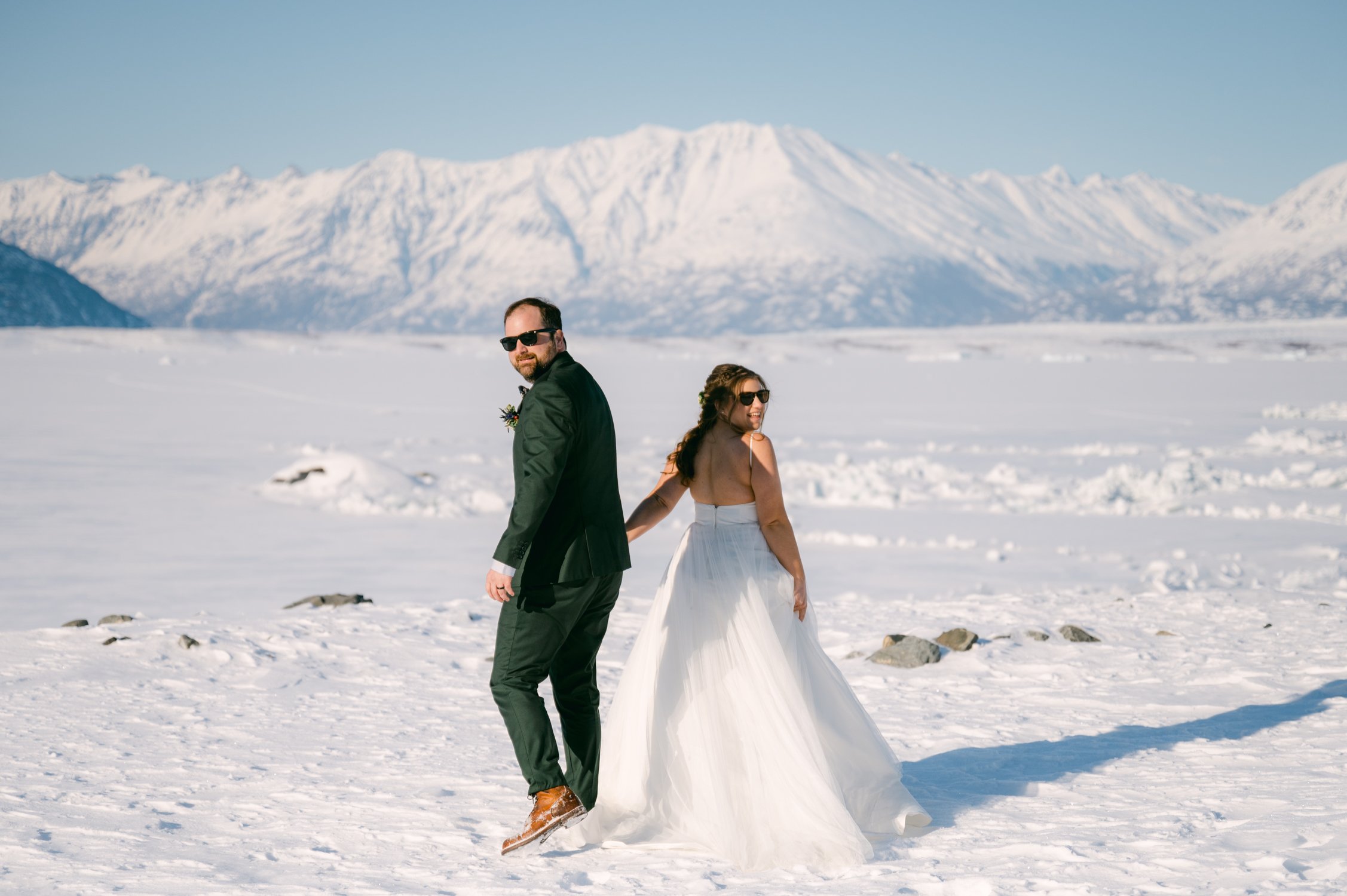 Girdwood Alaska helicopter elopement, photo of  a couple on a glacier