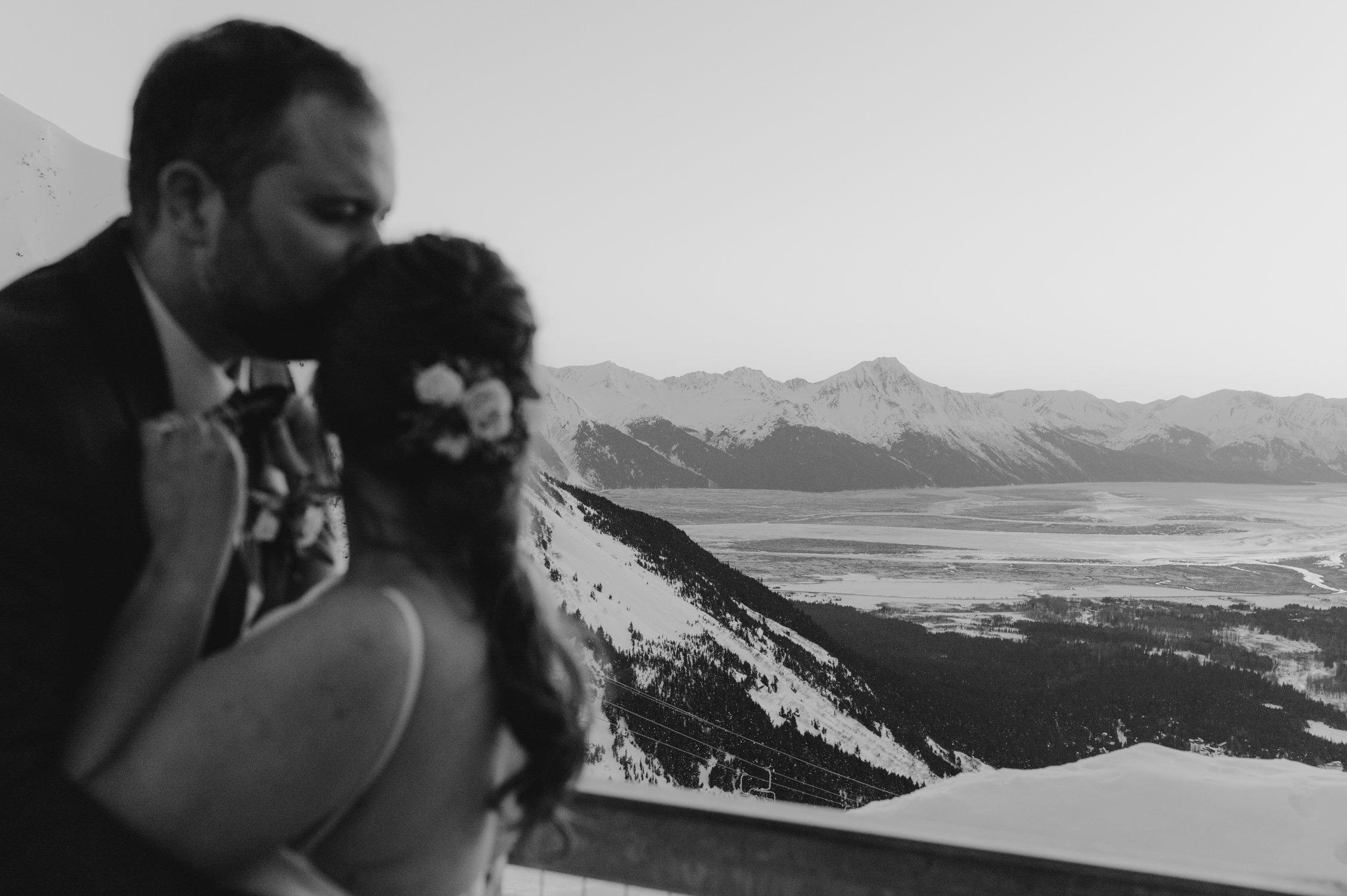 Girdwood Alaska helicopter elopement, photo of couple overlooking Girdwood 