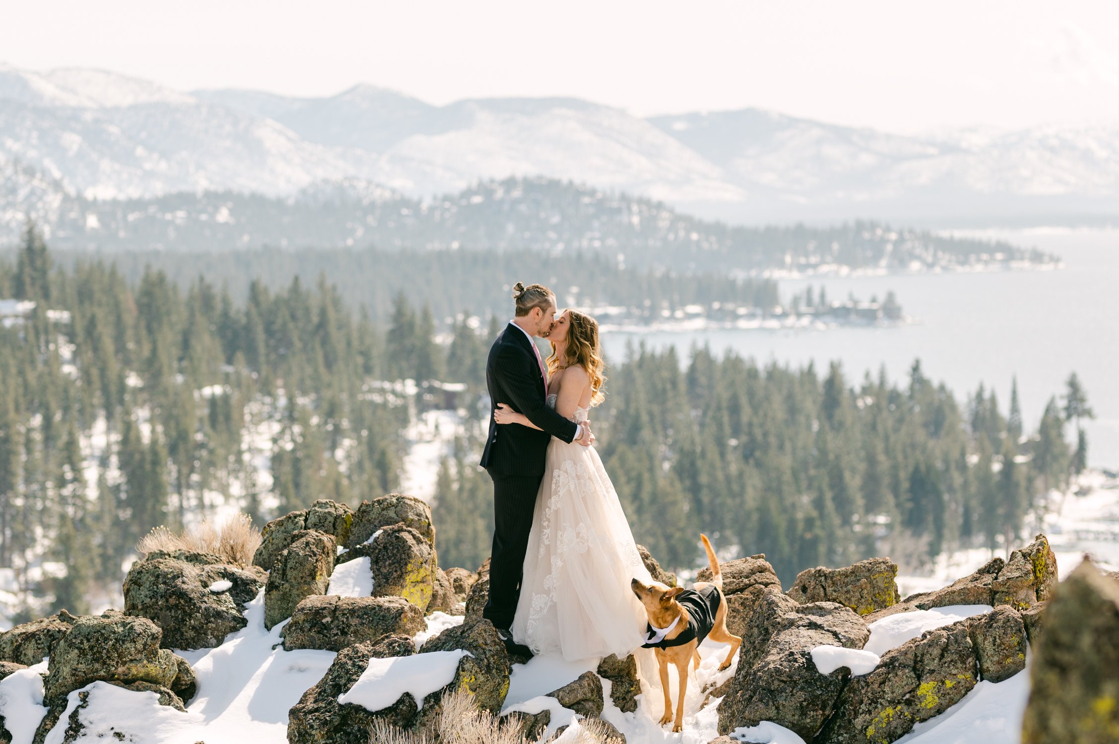 A wedding during a historic winter in tahoe, photo of couple on top of cave rock