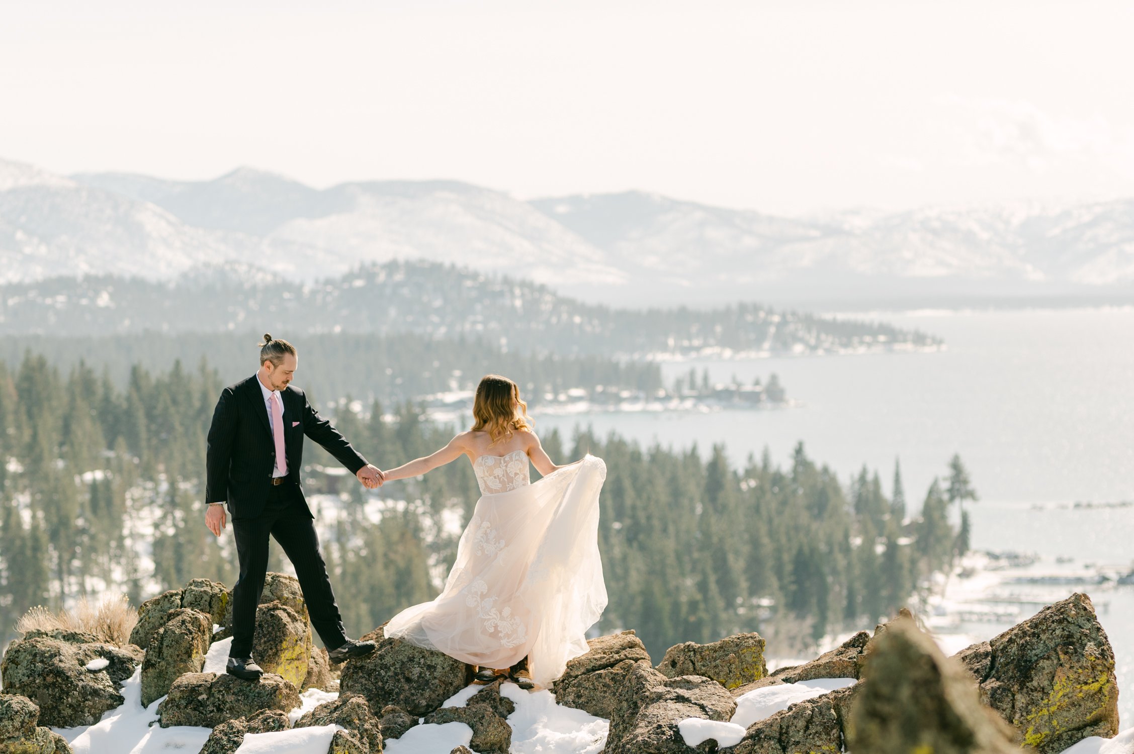 winter tahoe elopement, photo of couple on top of a mountain