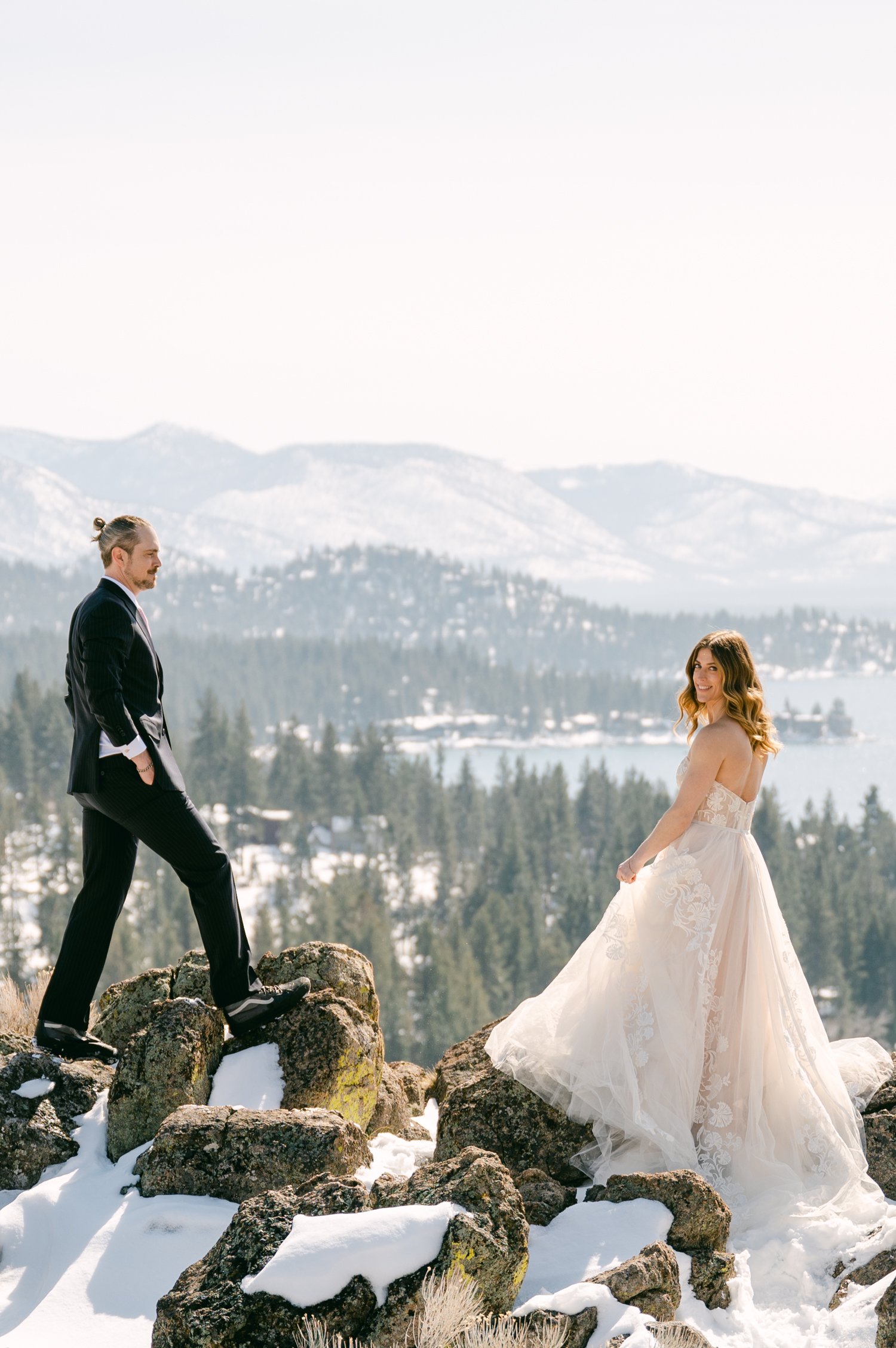 winter tahoe elopement, photo of couple on a mountain 