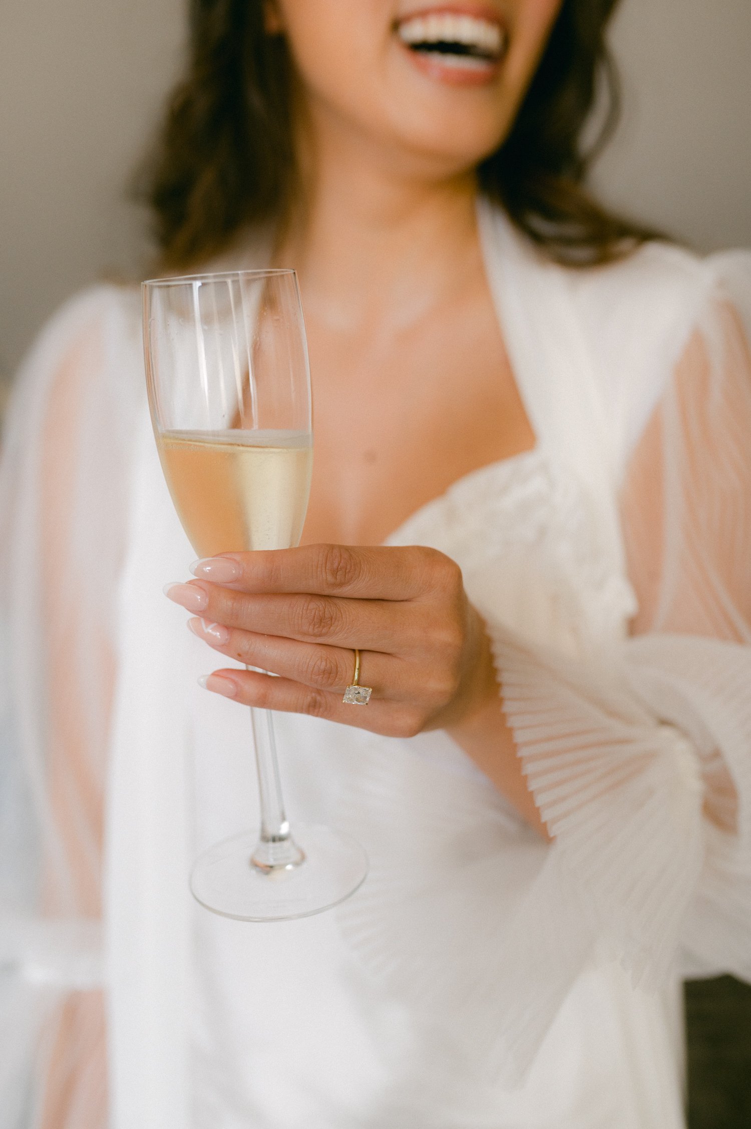 Pebble Beach Resort wedding, photo of bride holding a glass of champagne 