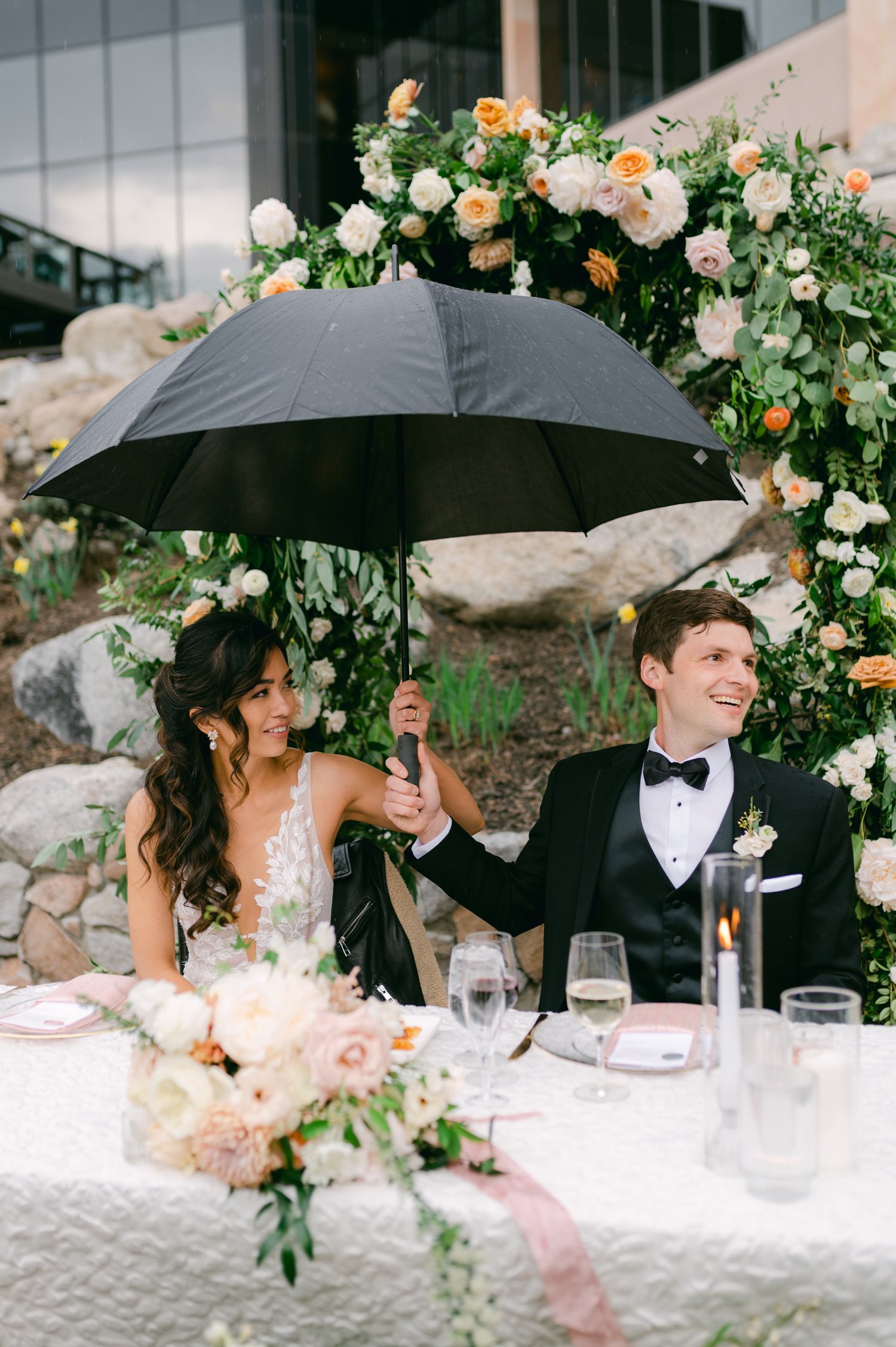Everyone Resort &amp; Spa Wedding Venue, photo of couple on a rainy day at everline