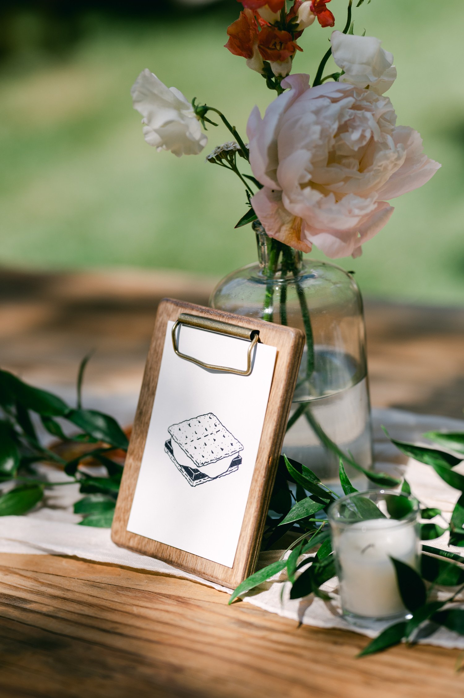 Desolation wilderness hotel wedding, photo of a table card with a photo of a smores on it