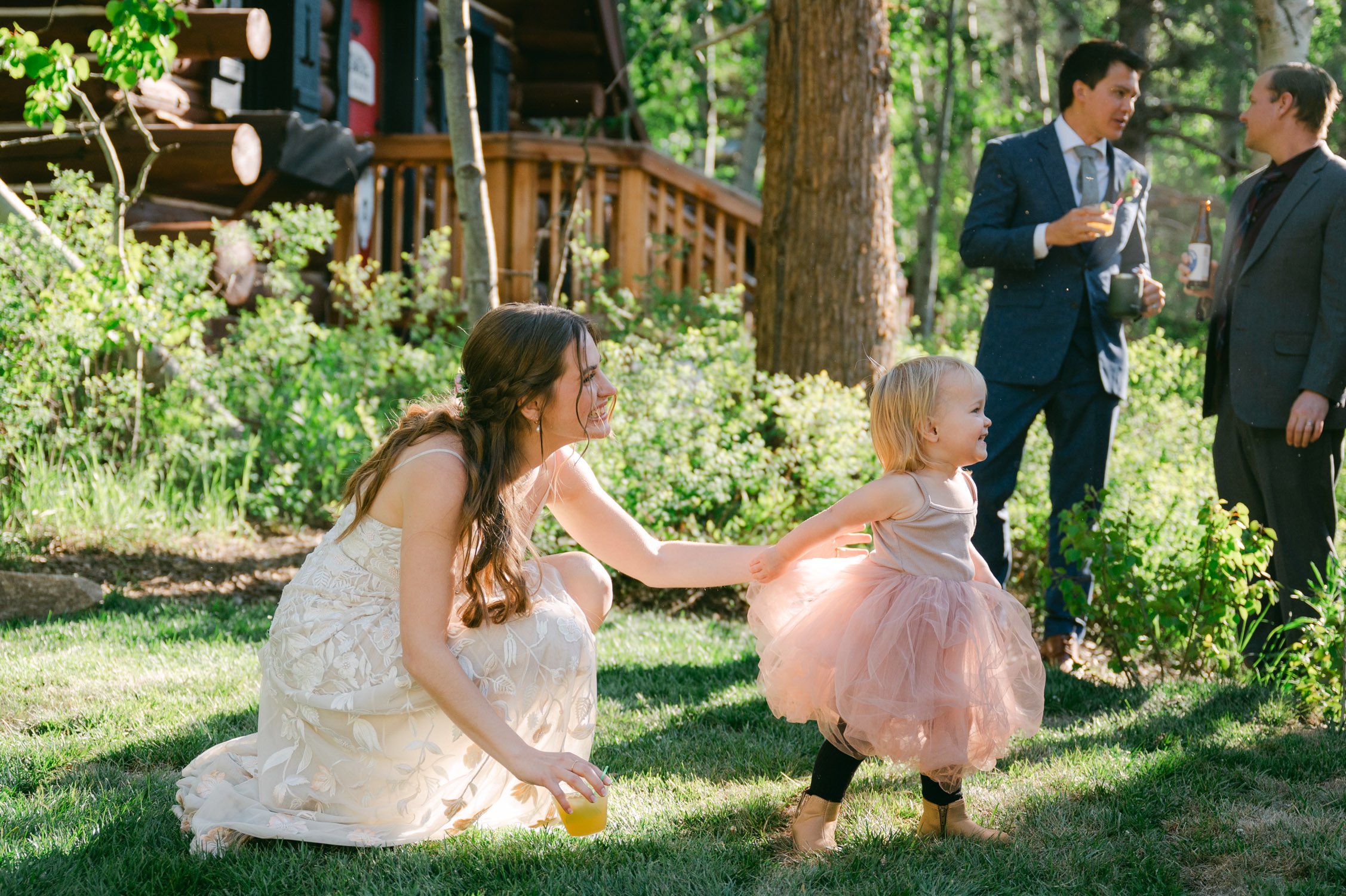 Desolation wilderness hotel wedding, photo of bride with a kid at a wedding