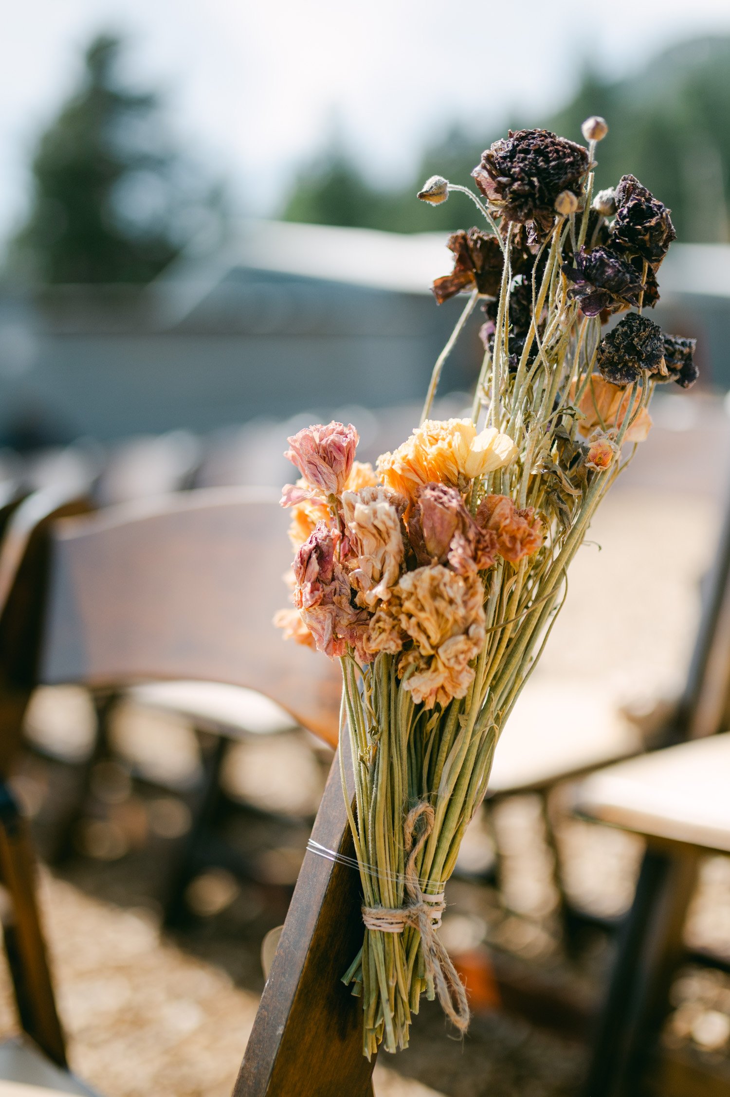 olympic valley stables wedding, photo of the dried flowers attached to the chair