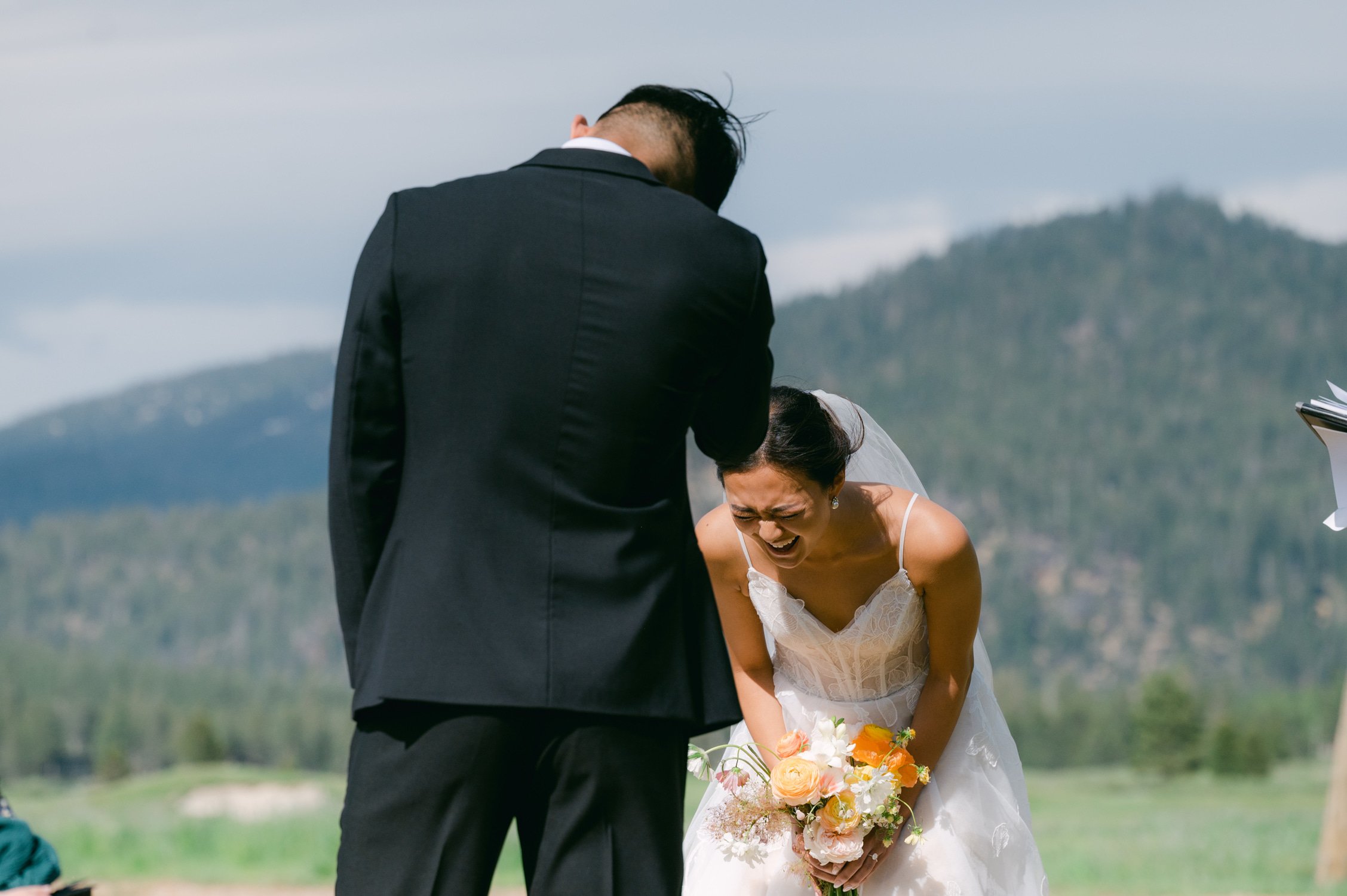 olympic valley stables wedding, photo of the newly wed couple laughing
