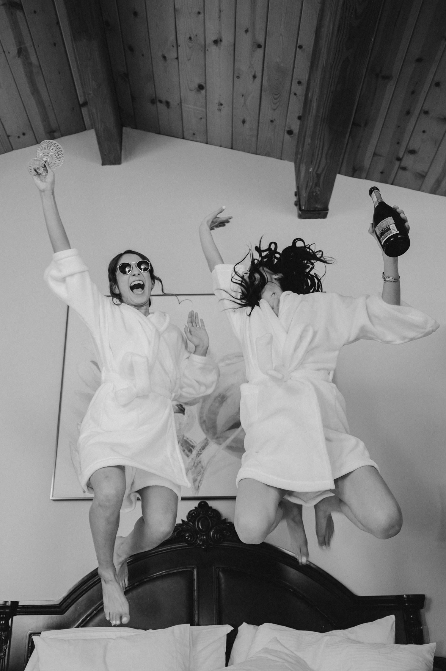 tahoe event center - lake tahoe wedding, photo of the bride and bridesmaid doing a jump shot during the morning preparation
