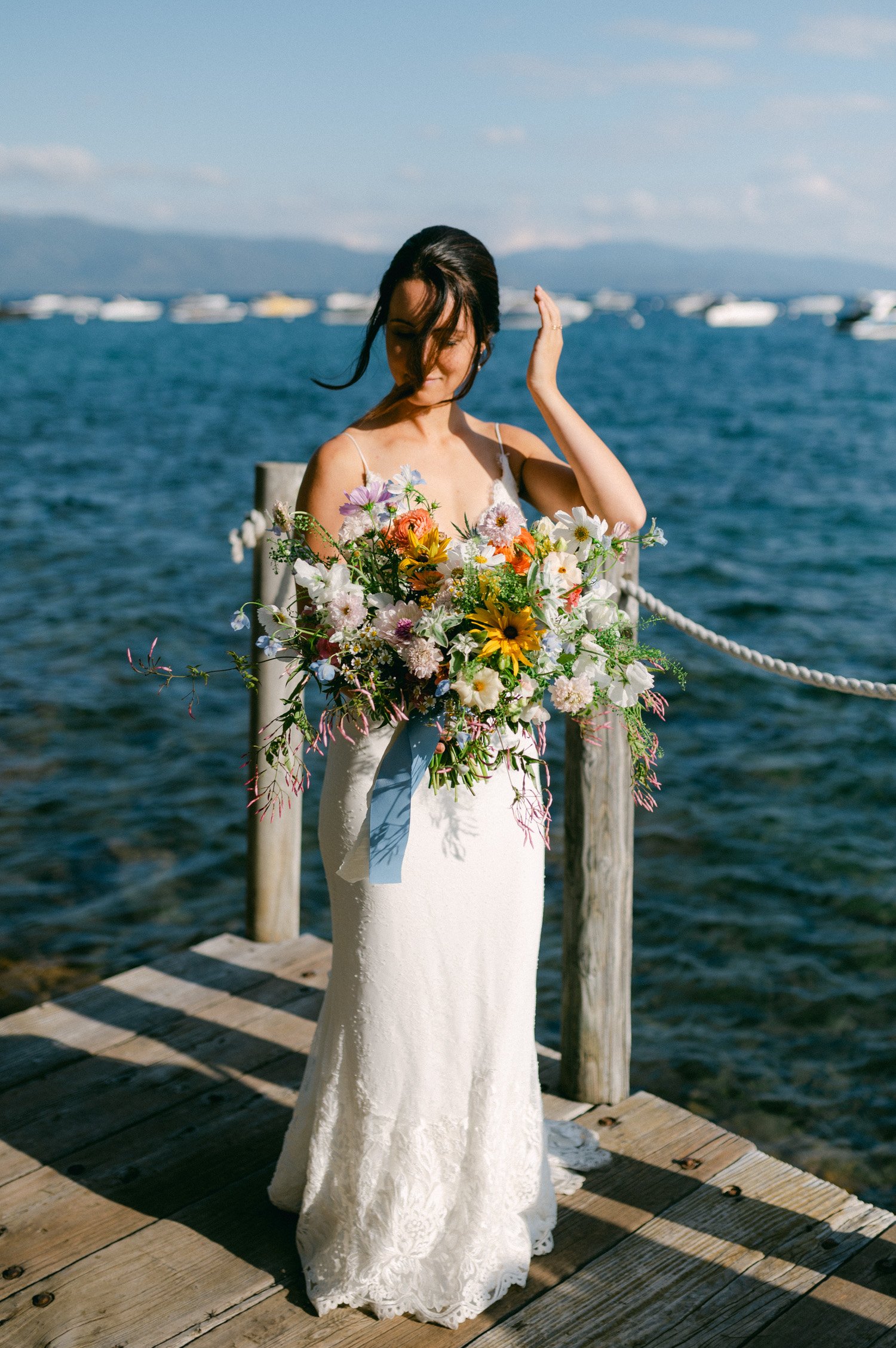 lake tahoe wedding, photo of the bride with her colorful wedding bouquet 
