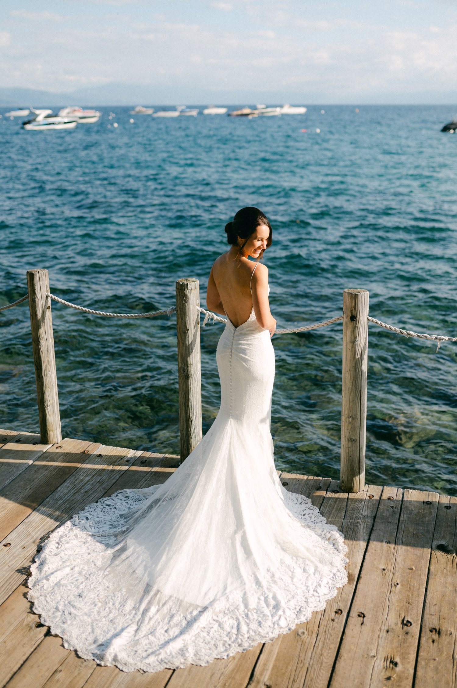 lake tahoe wedding, photo of the bride showing the back of her wedding dress