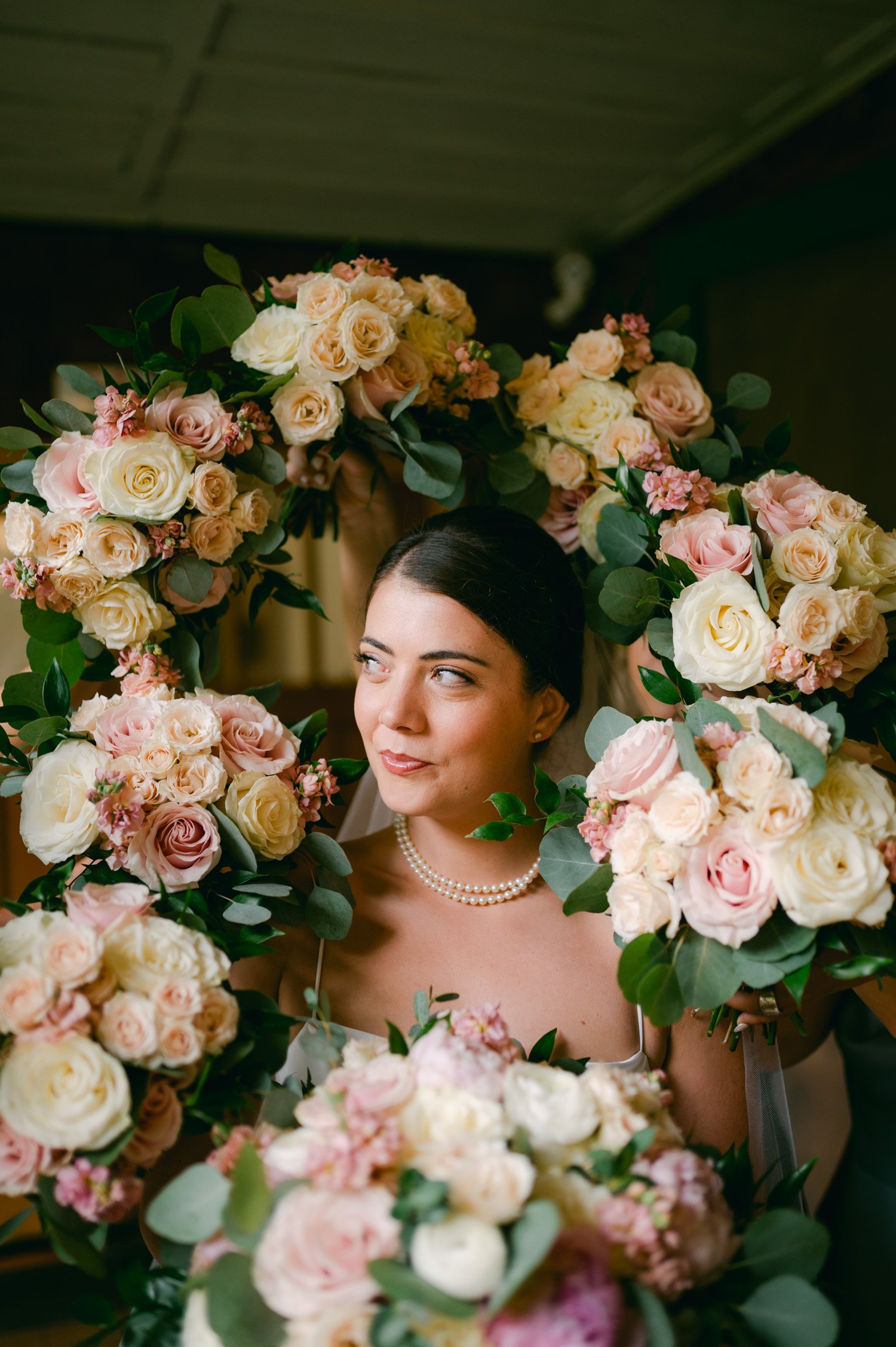 Valhalla Lake Tahoe wedding, photo of the wedding bouquets surrounding the bride