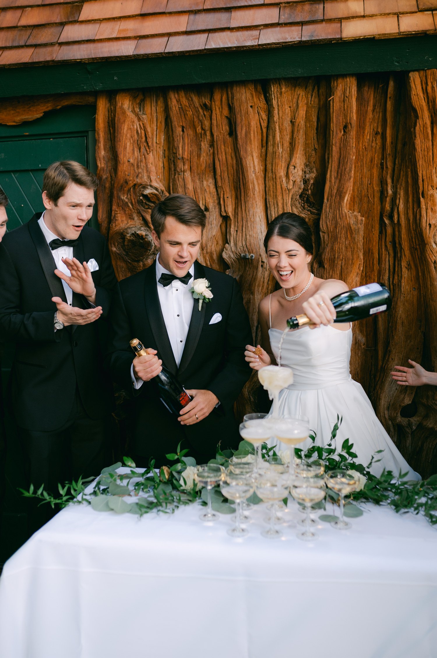 Valhalla Lake Tahoe wedding, photo of the bride pouring champagne