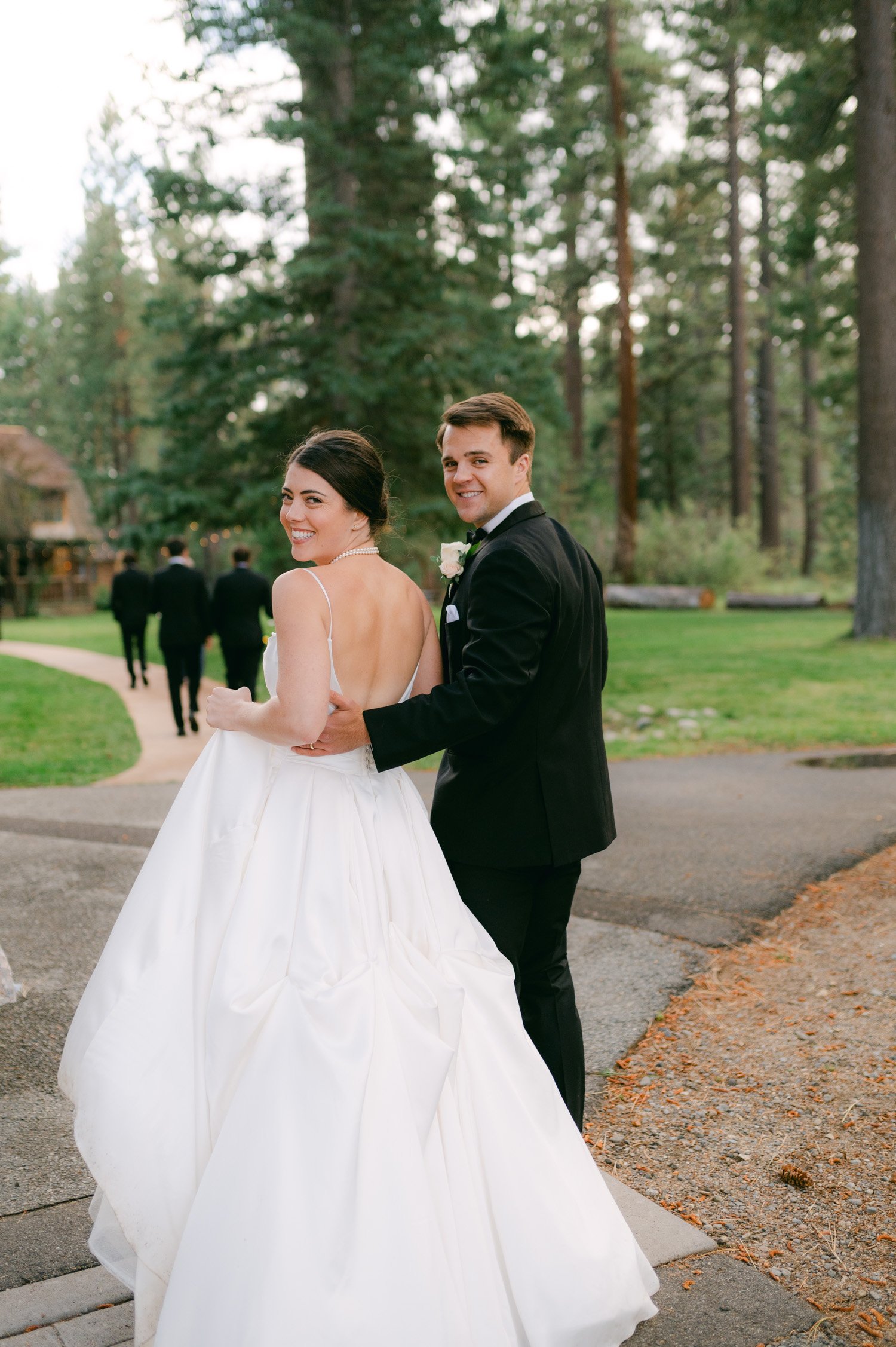 Valhalla Lake Tahoe wedding, photo of the newly wed couple smiling while walking