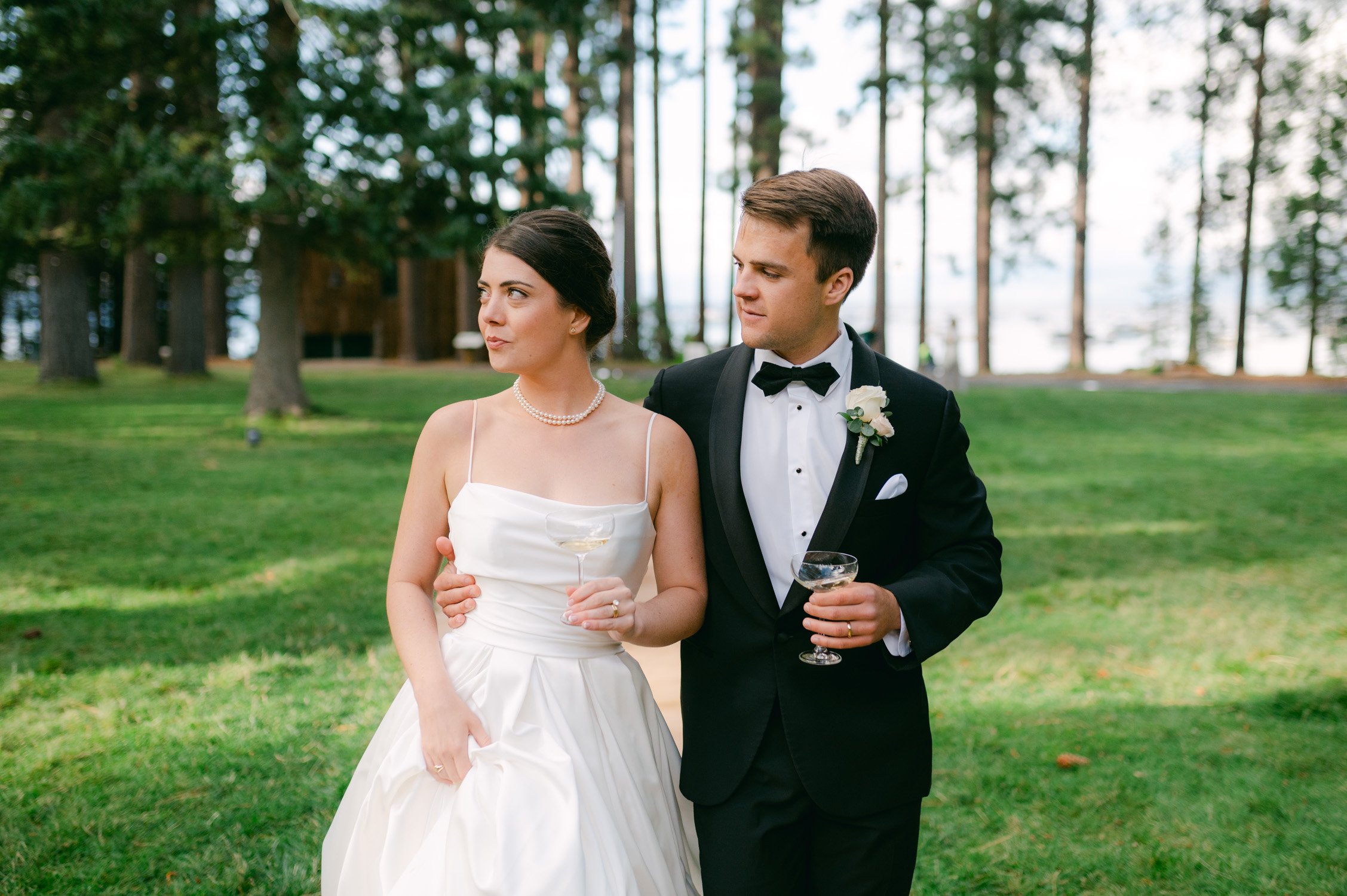 Valhalla Lake Tahoe wedding, photo of the groom looking at the bride holding champagne glass 