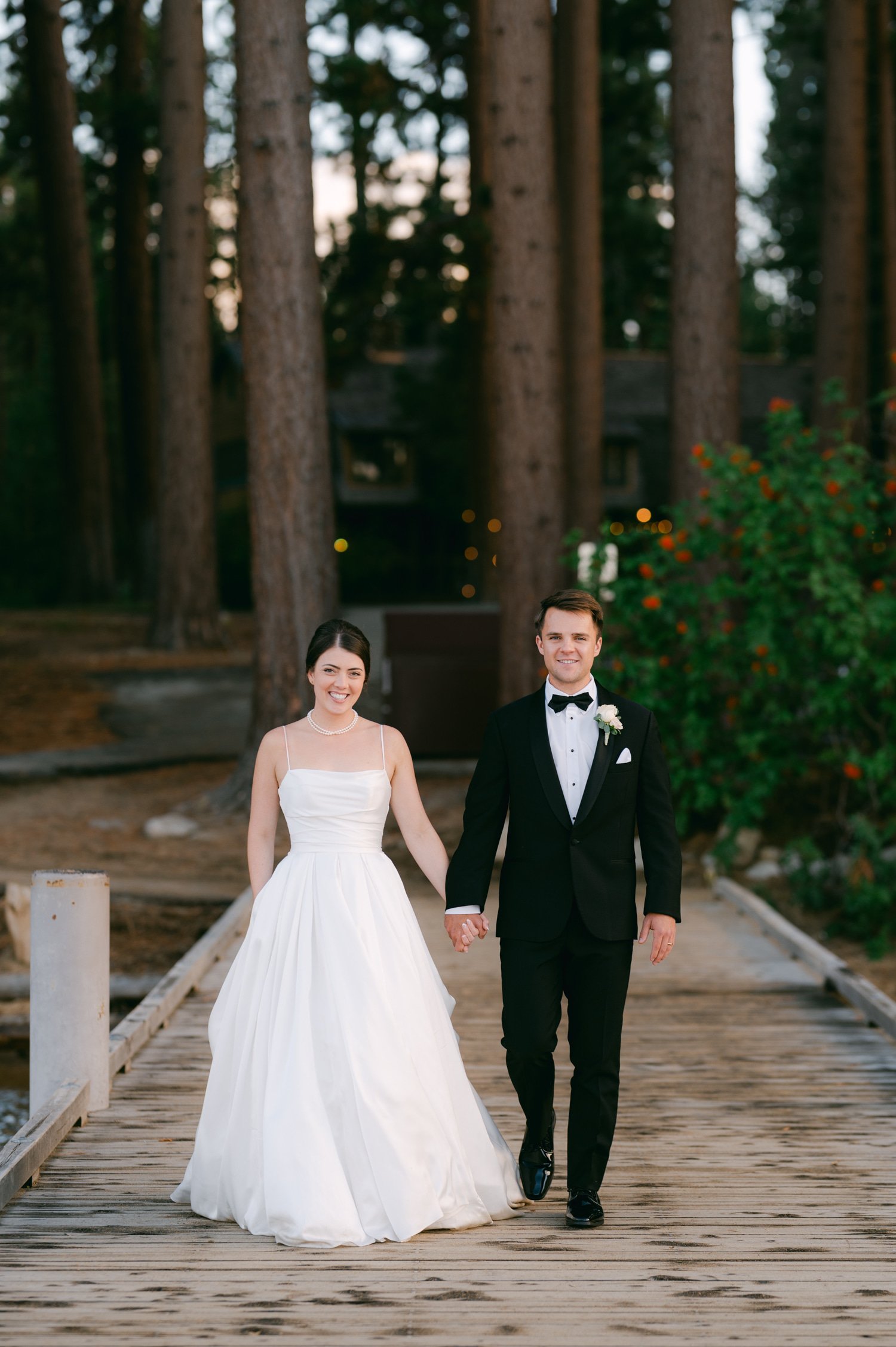 Valhalla Lake Tahoe wedding, photo of the newly wed couple holding hands during their portrait session 