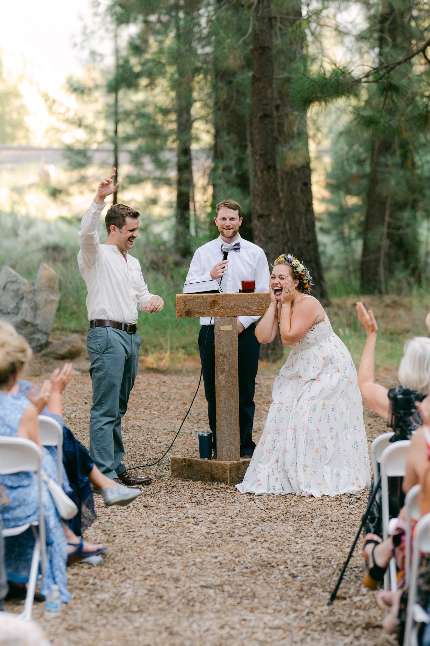 graeagle corner barn wedding, photo of the newly wed couple having fun during their wedding ceremony