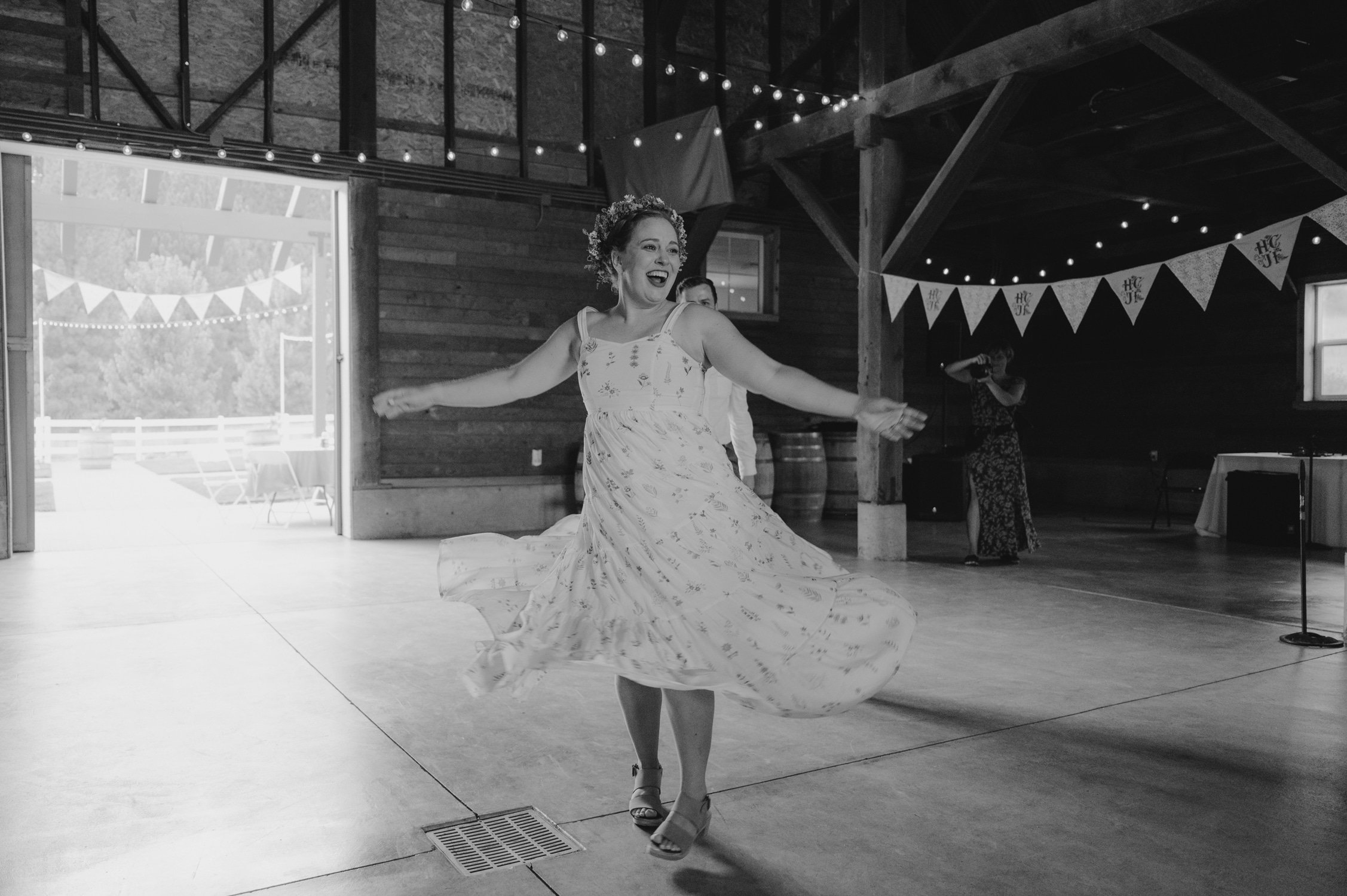 graeagle corner barn wedding, photo of the bride doing a twirl