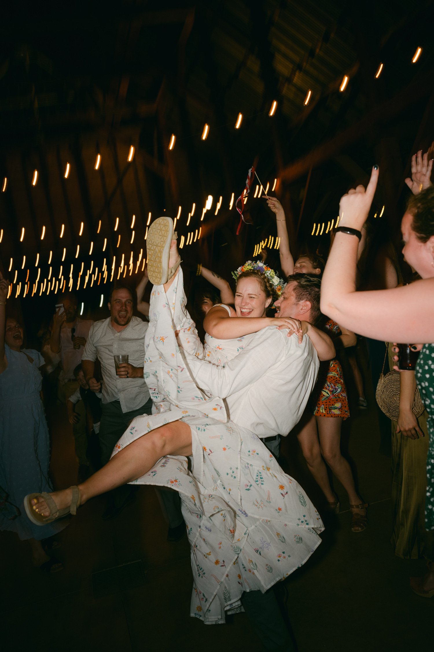 graeagle corner barn wedding, photo of the newly wed couple dancing and having fun with the guests