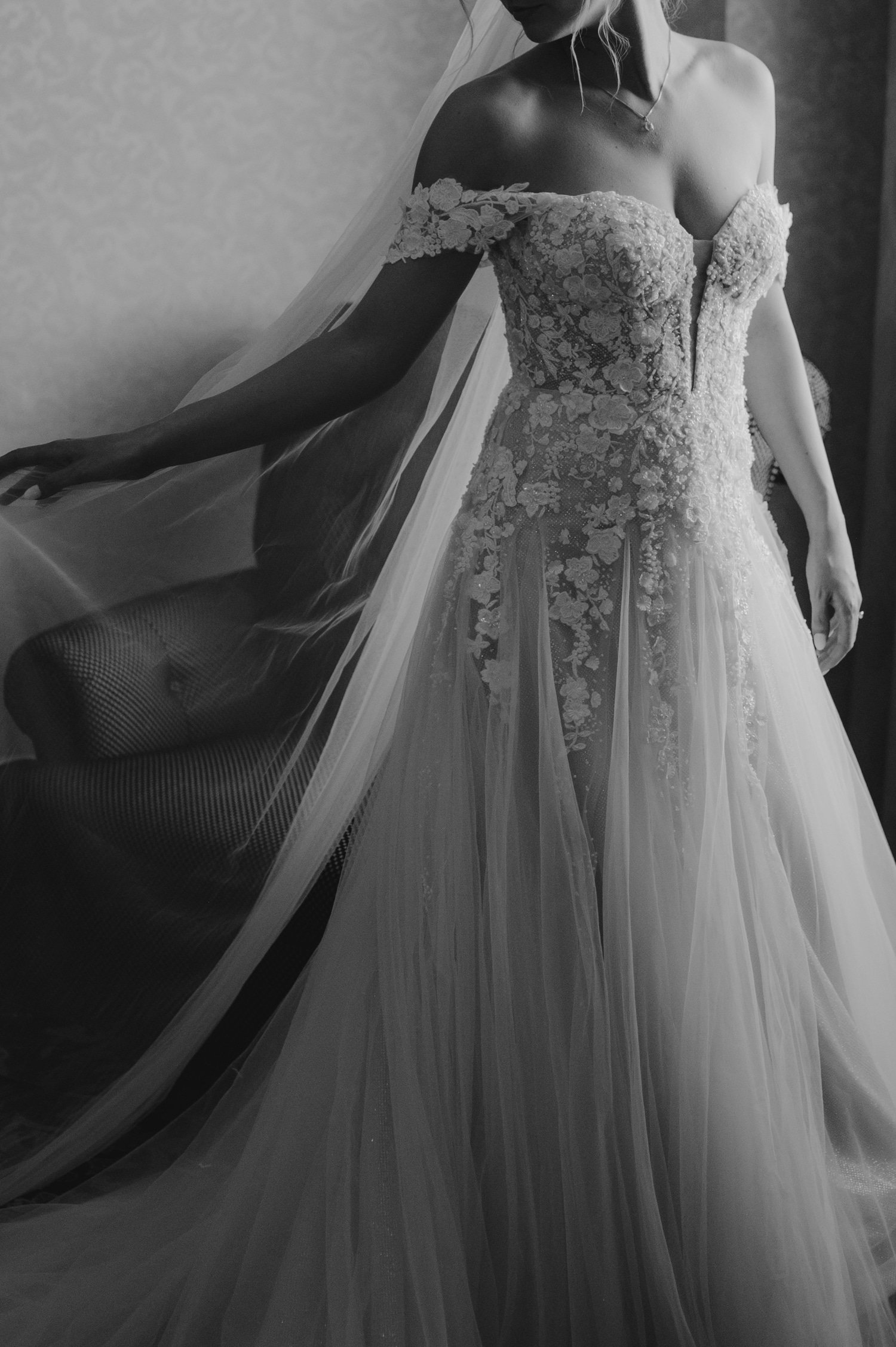 California academy of Sciences in San Francisco Wedding,  photo of the bride’s wedding dress with lace details and long veil