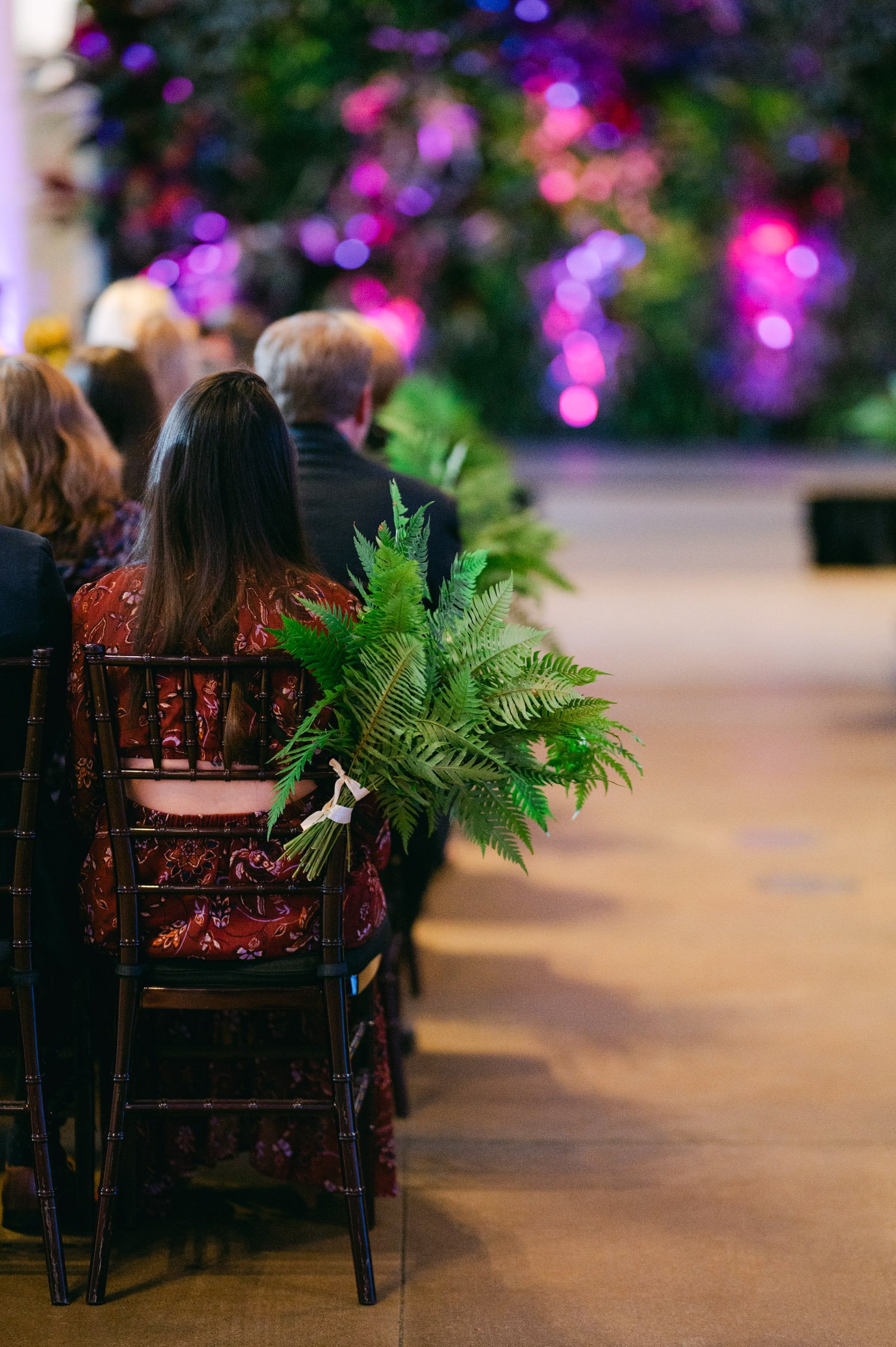 California academy of Sciences in San Francisco Wedding, photo of the wedding seat decor with plants