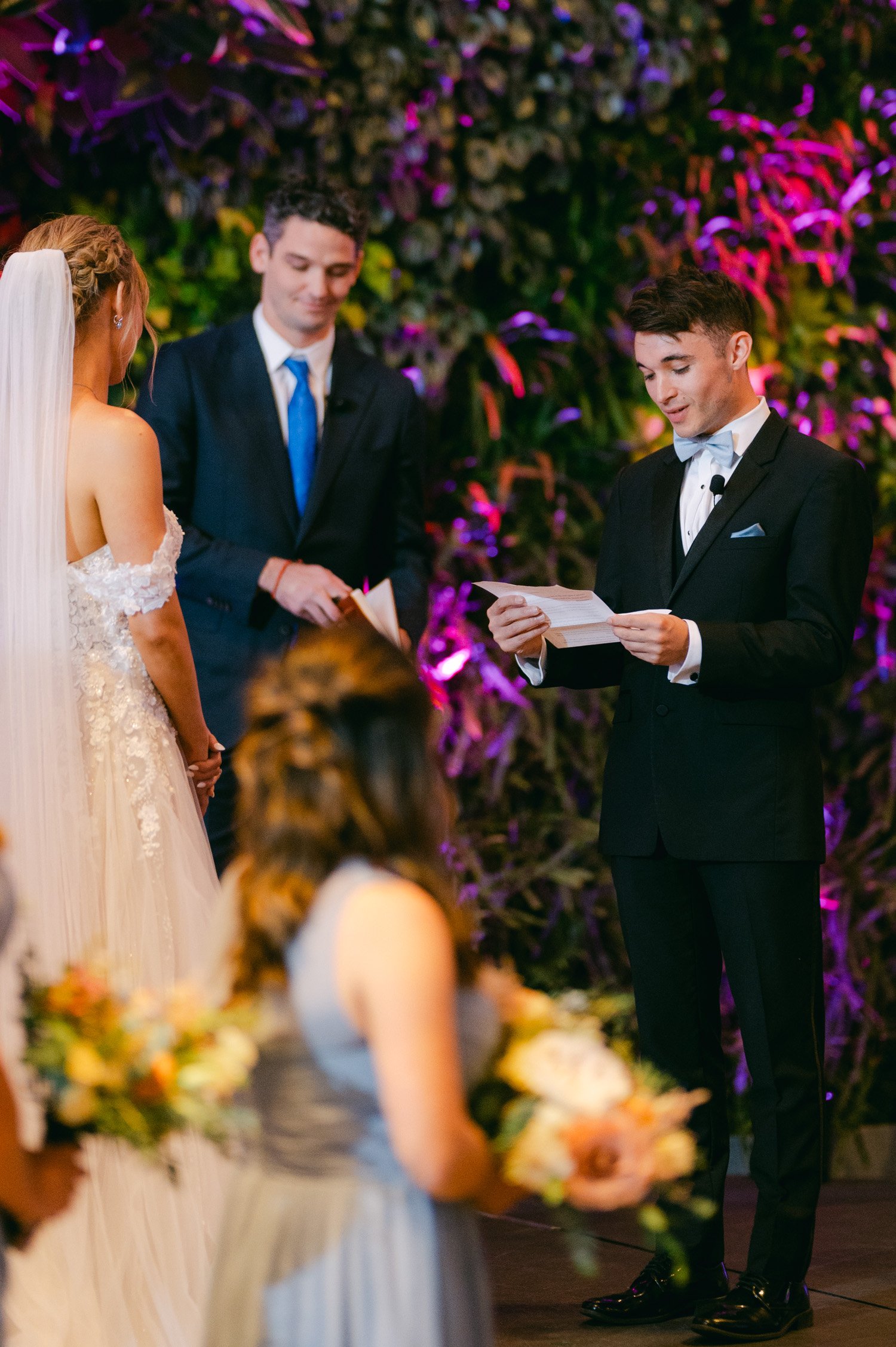 California academy of Sciences in San Francisco Wedding, photo of the groom giving his vows to the bride