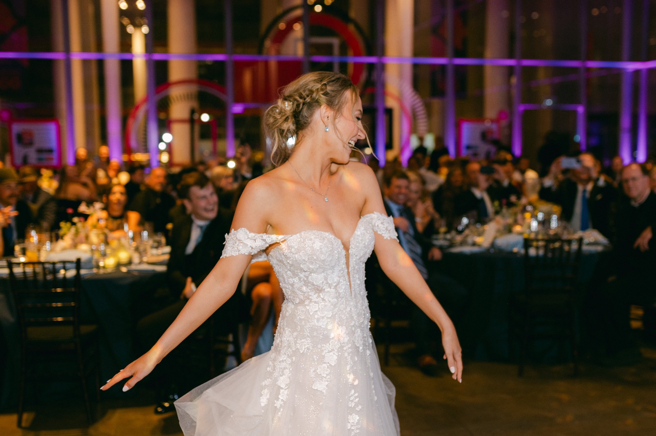 California academy of Sciences in San Francisco Wedding, photo of the bride dancing during their wedding reception entrance